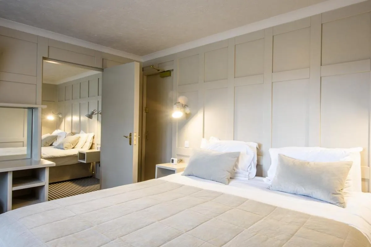 Bed in Les Douvres Hotel