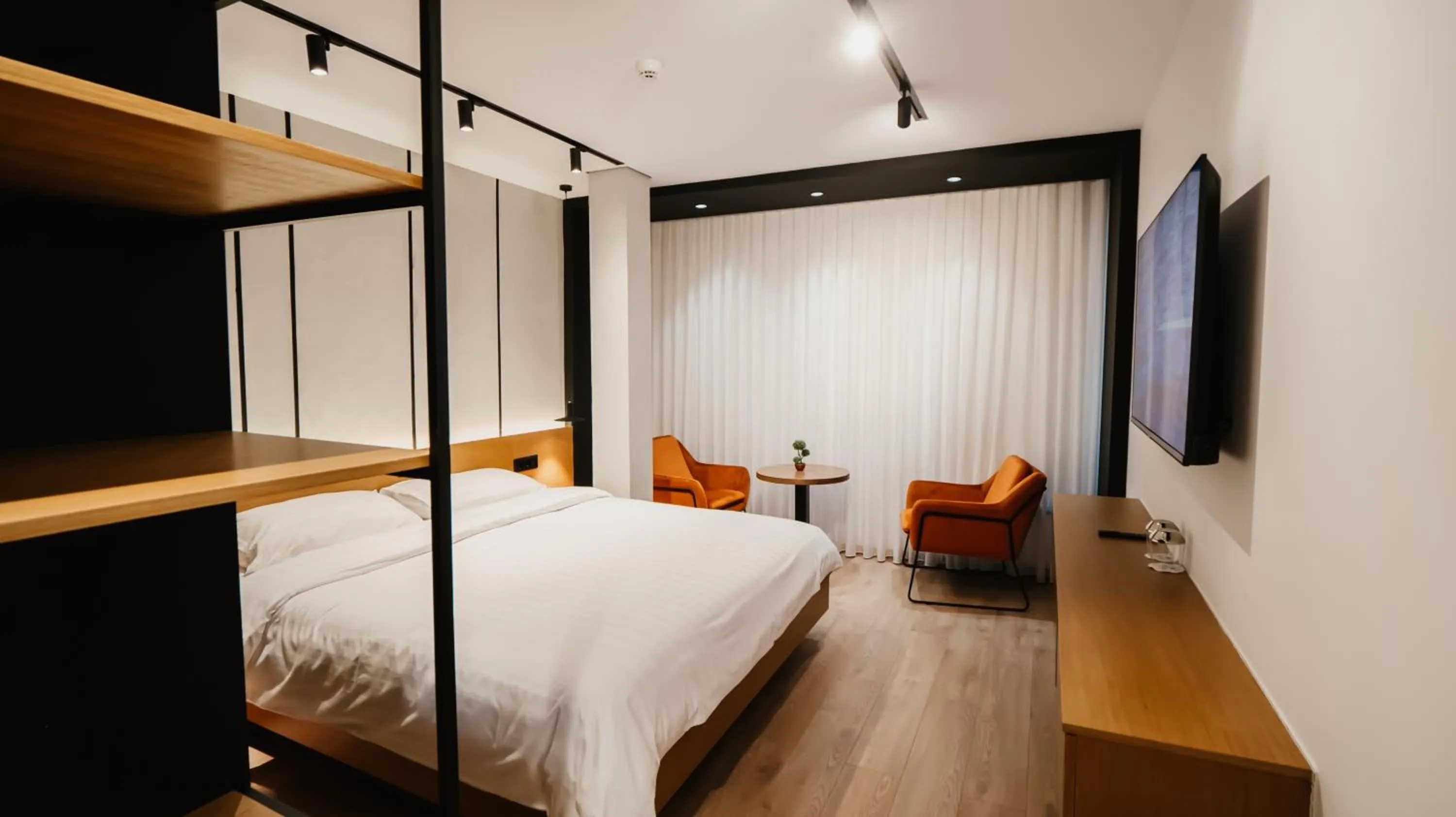 Bed in BAZ'HUR Boutique Hotel