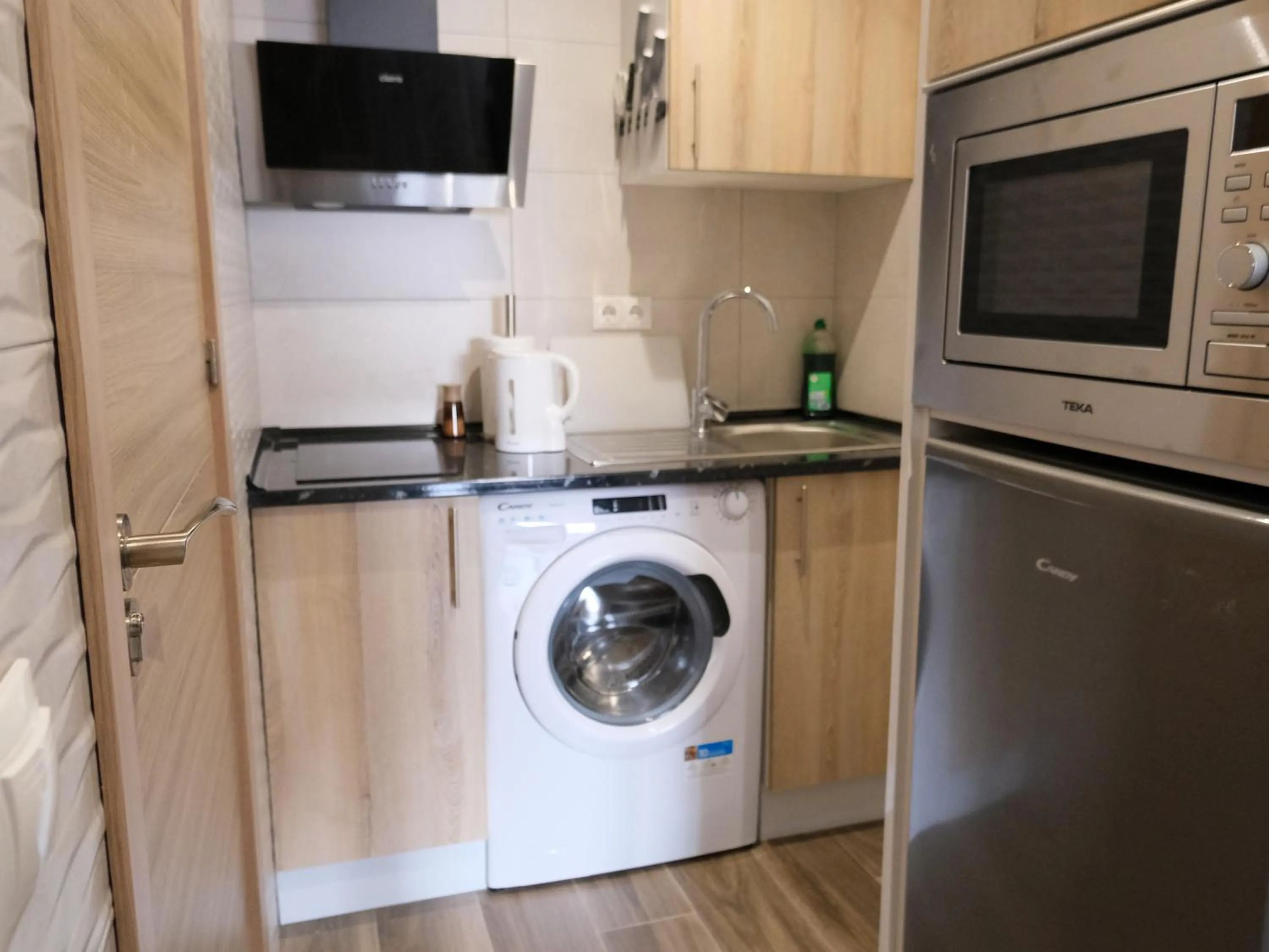 Kitchen or kitchenette in Alianza Suites