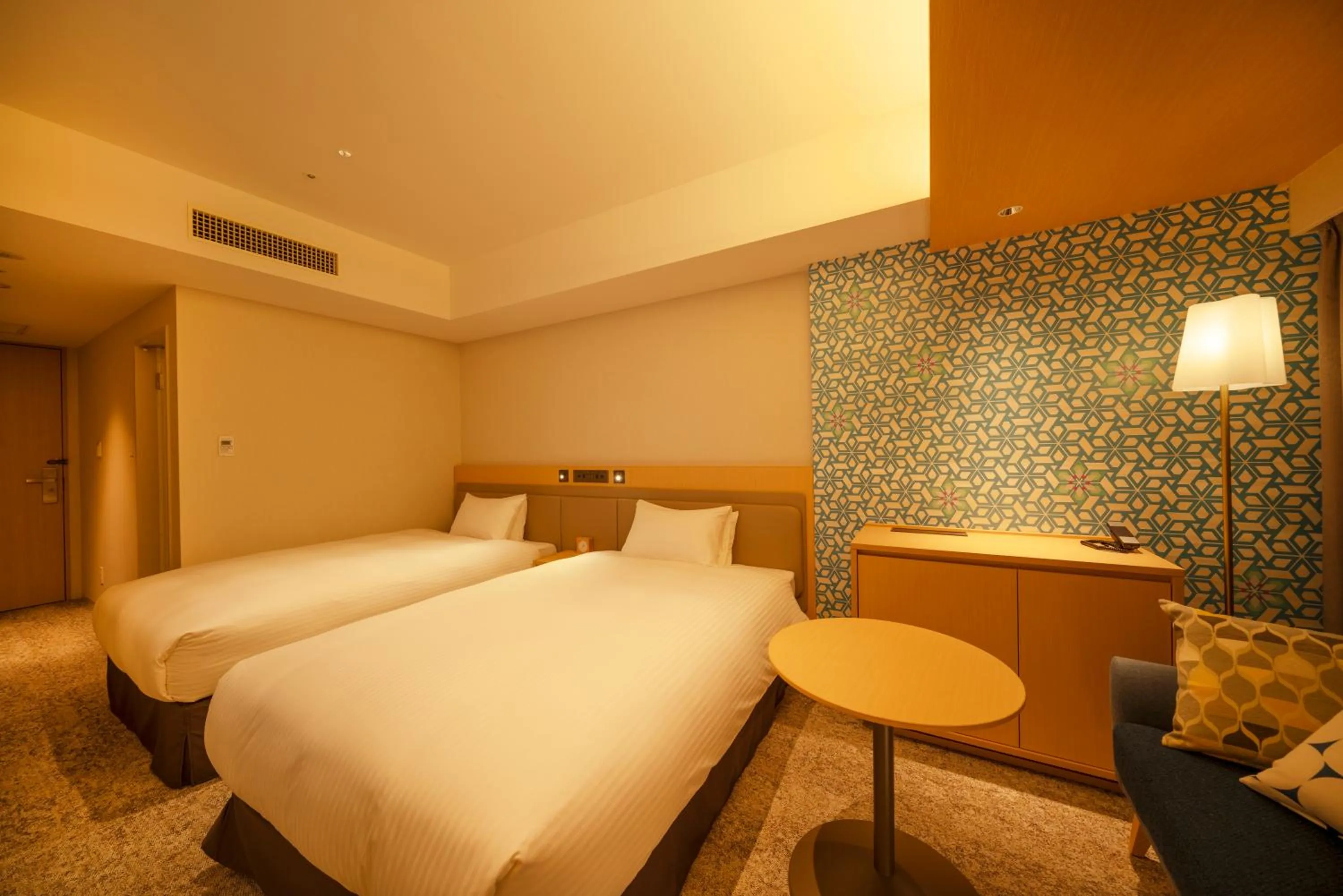 Bed in Hotel Emion Sapporo