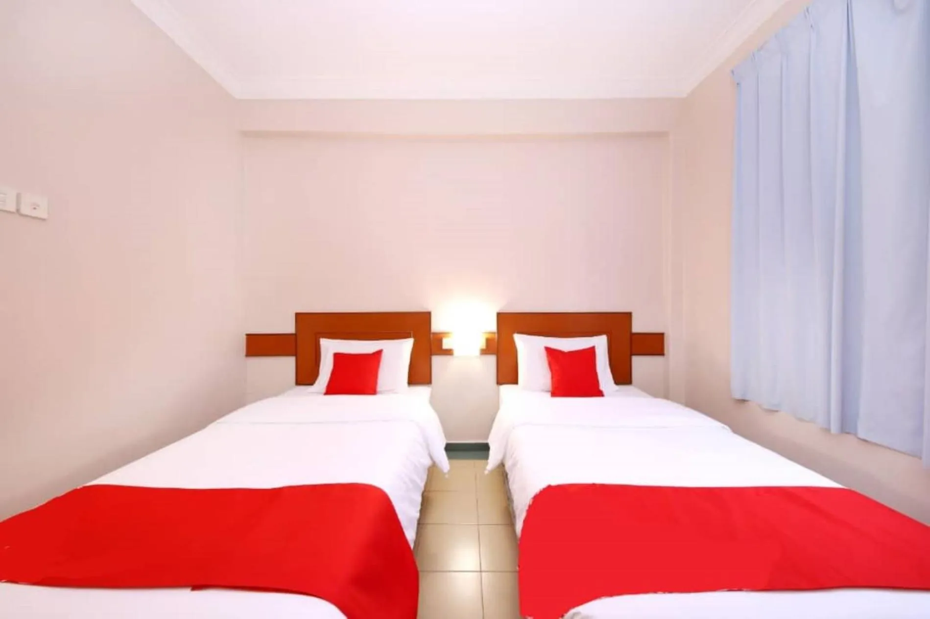 Bed in Famous Inn Hotel