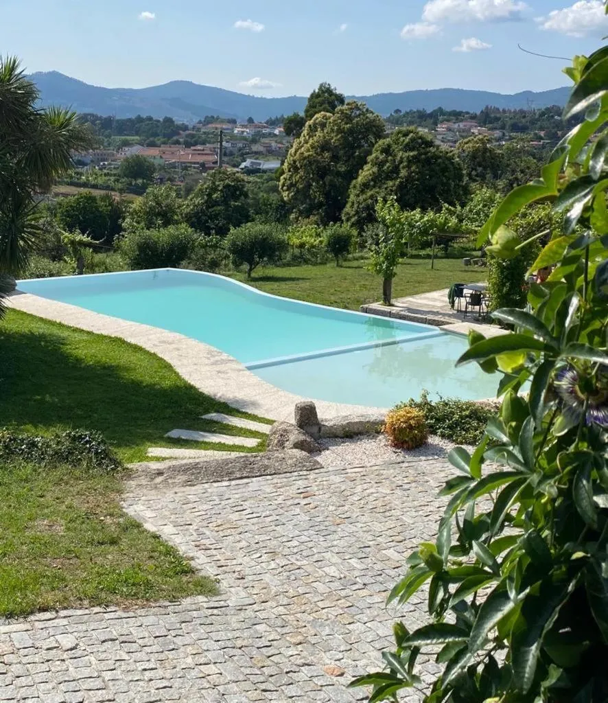 Swimming pool in Hotel Quinta da Tulha By VimaHotels