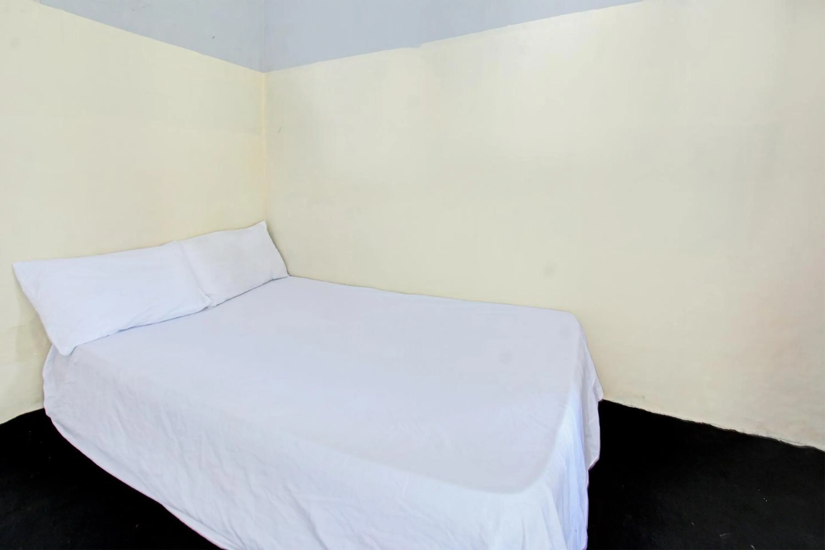 Bedroom in OYO Life 92853 Kost 999