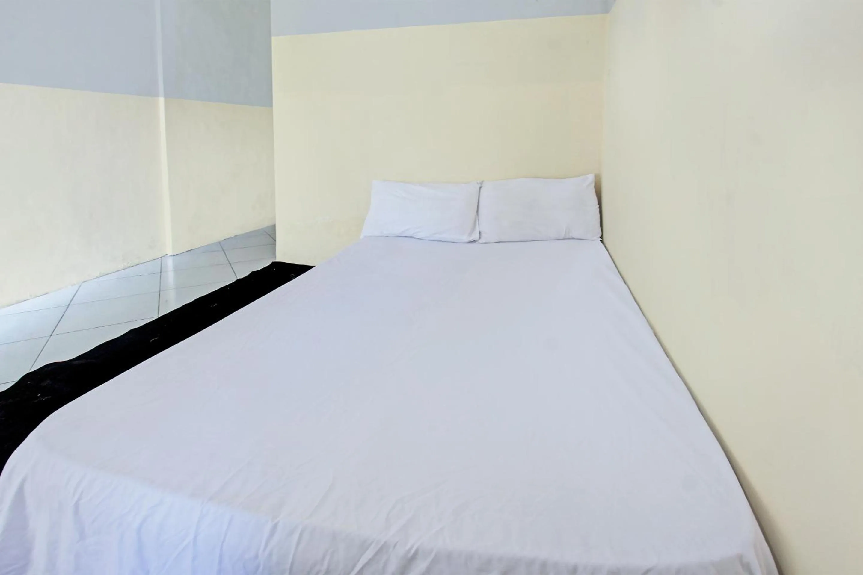 Bedroom in OYO Life 92853 Kost 999