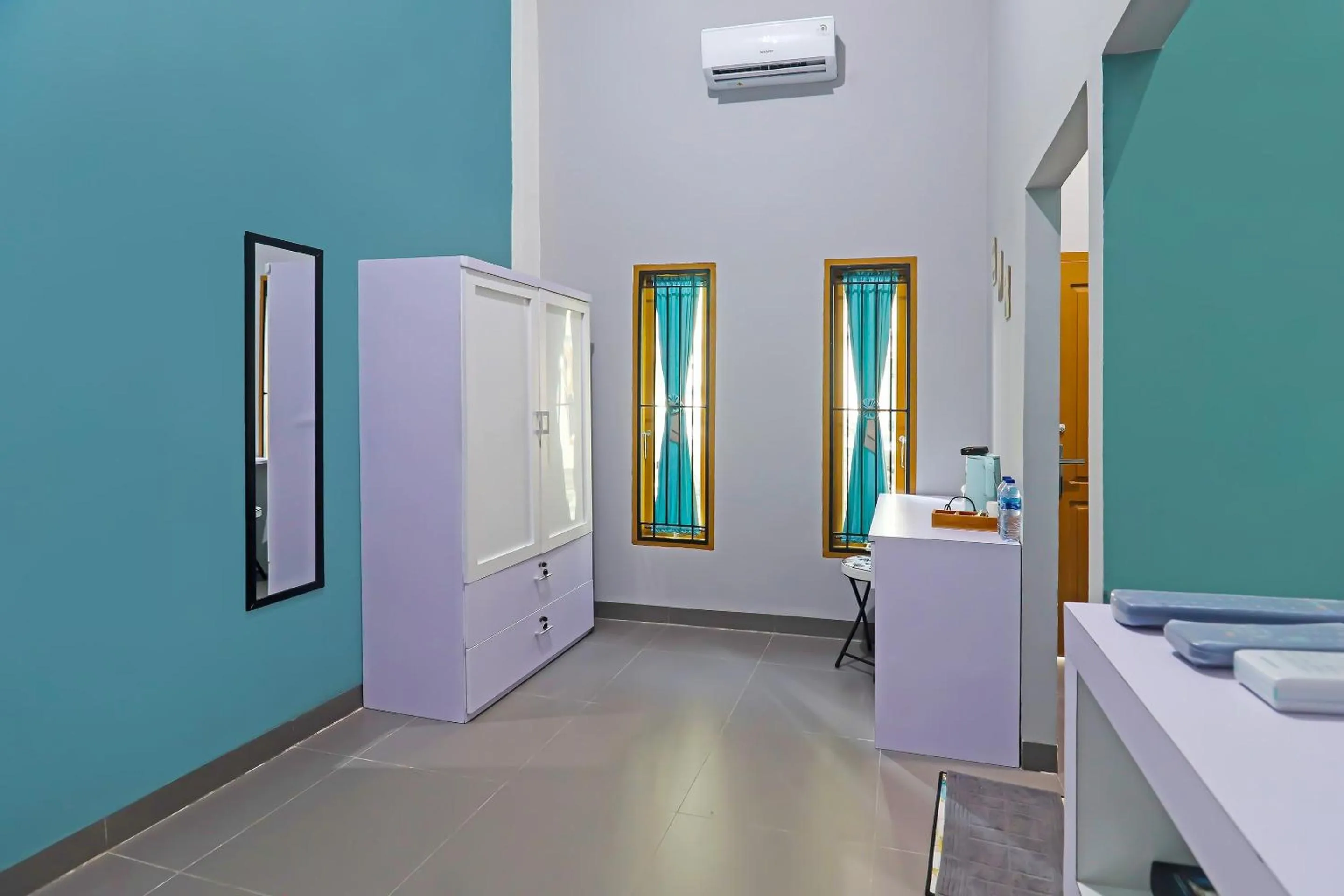 Bedroom in OYO Life 92691 Mc Kost Syariah