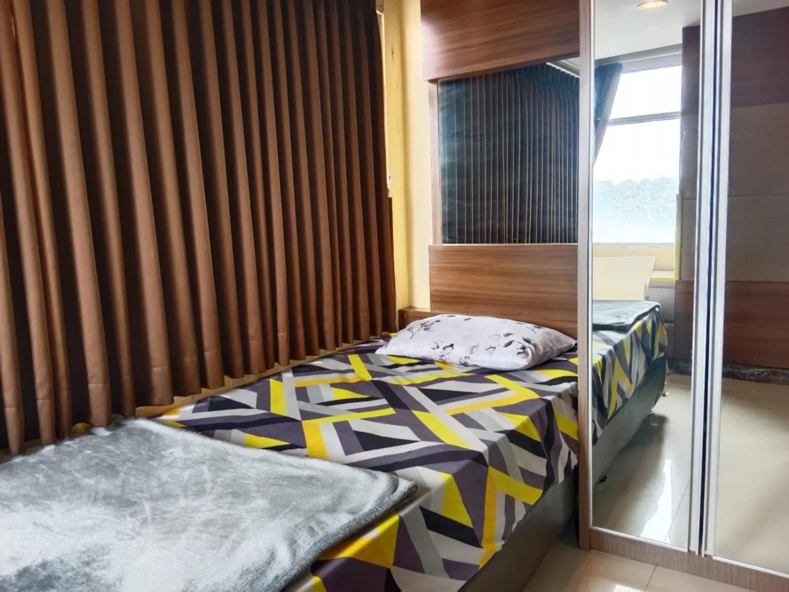 Bedroom, Bed in OYO Life 92649 Jarrdin Apartment By Glory