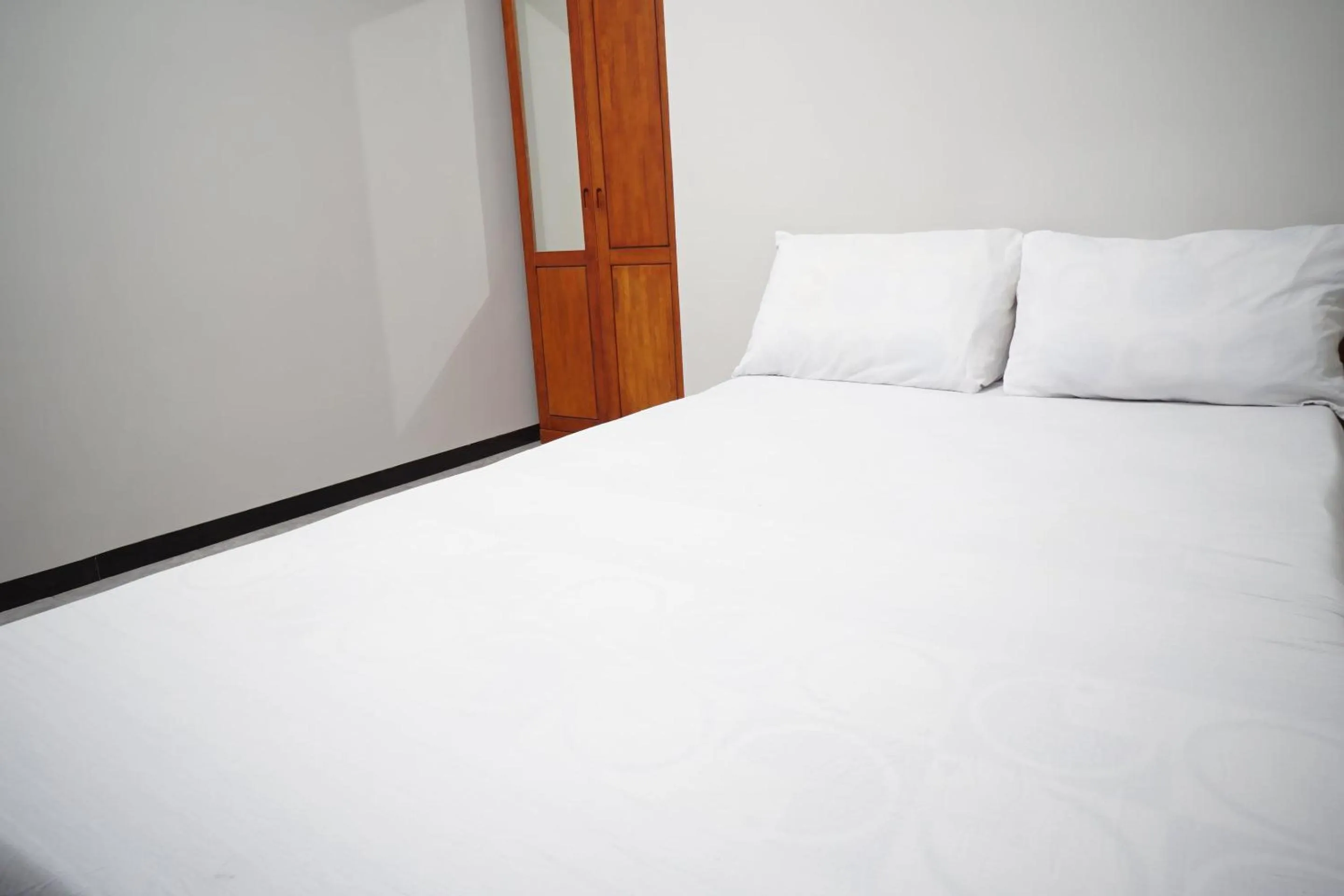 Bedroom, Bed in OYO Life 93045 Kost Putra Bu Ketut