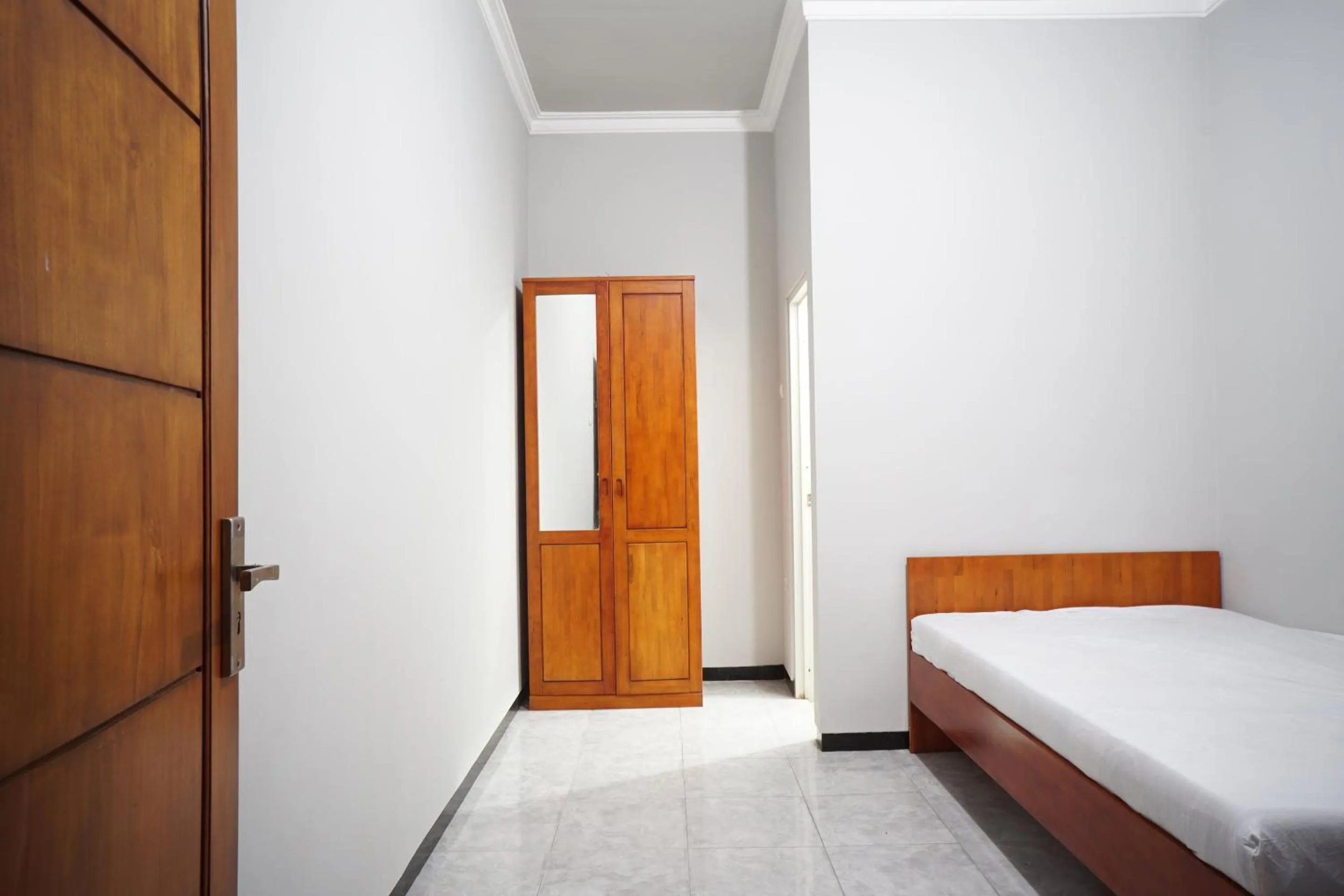 Bedroom, Bed in OYO Life 93045 Kost Putra Bu Ketut