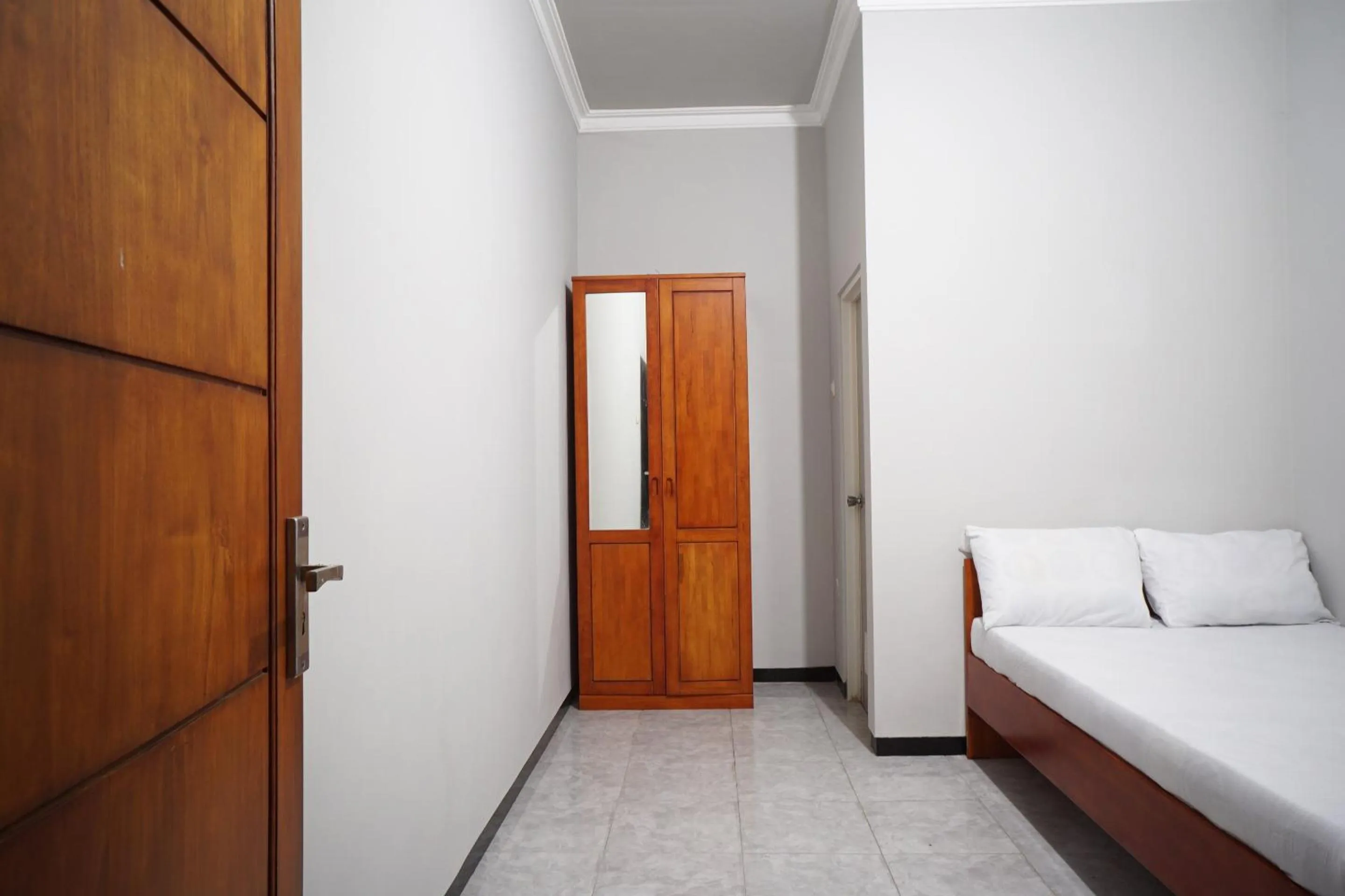 Bedroom, Bed in OYO Life 93045 Kost Putra Bu Ketut