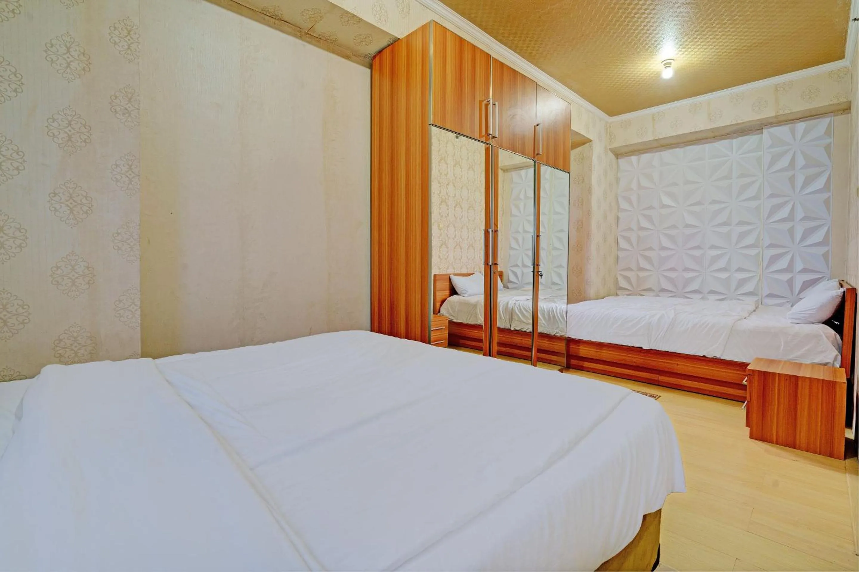 Bedroom, Bed in OYO Life 92978 Apartement Gateway Cicadas By Az Pro
