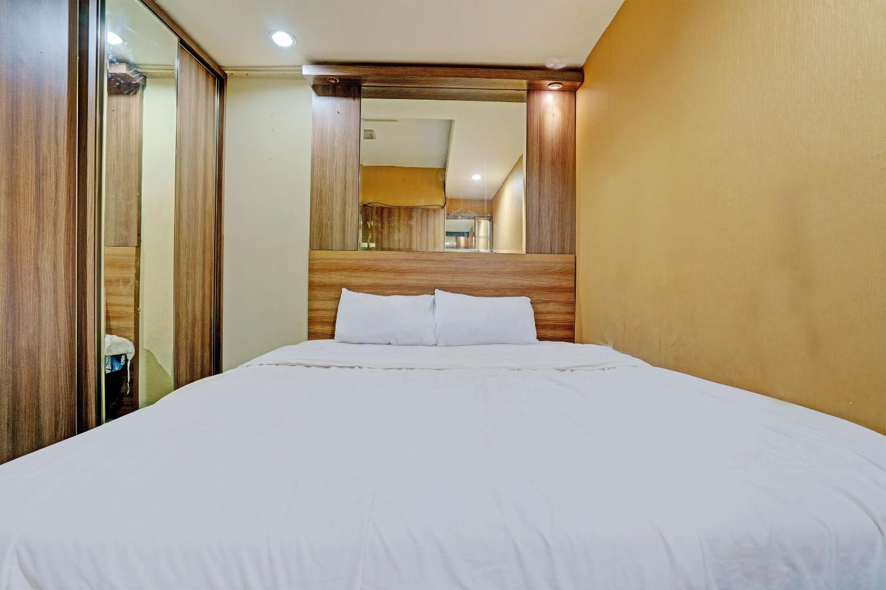 Bedroom, Bed in OYO Life 92978 Apartement Gateway Cicadas By Az Pro