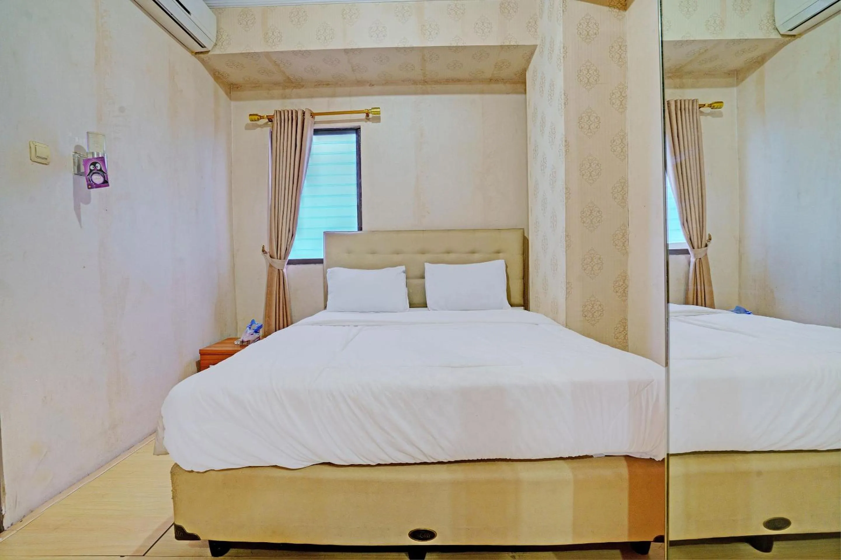 Bedroom, Bed in OYO Life 92978 Apartement Gateway Cicadas By Az Pro