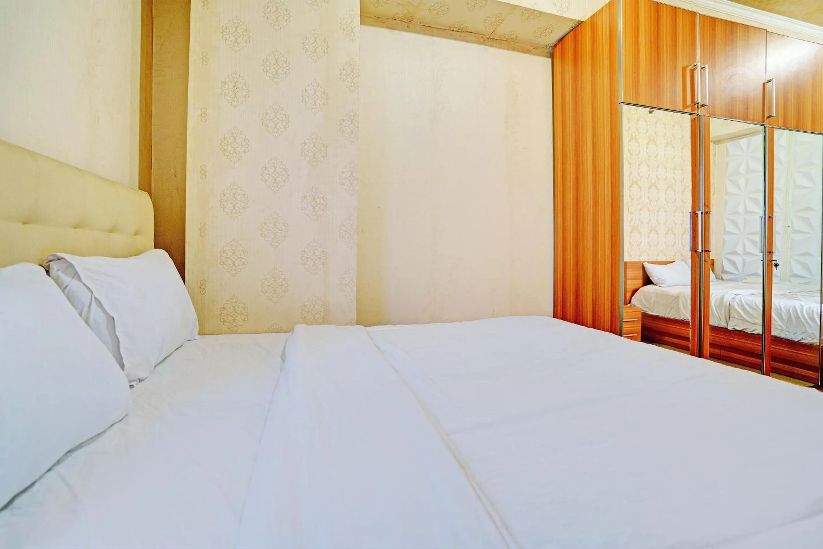 Bedroom, Bed in OYO Life 92978 Apartement Gateway Cicadas By Az Pro