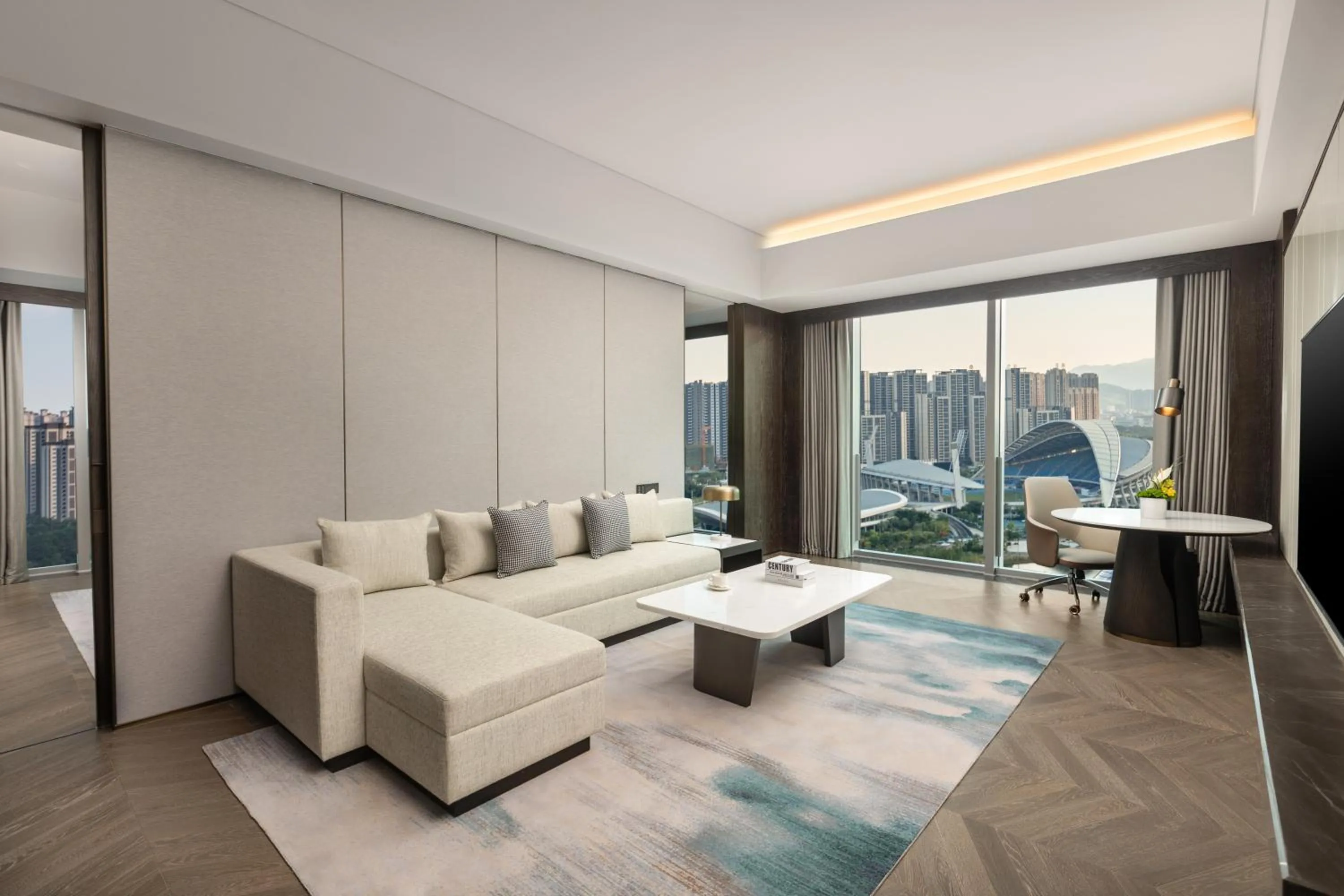 Living room in Crowne Plaza Jiangmen Binjiang by IHG