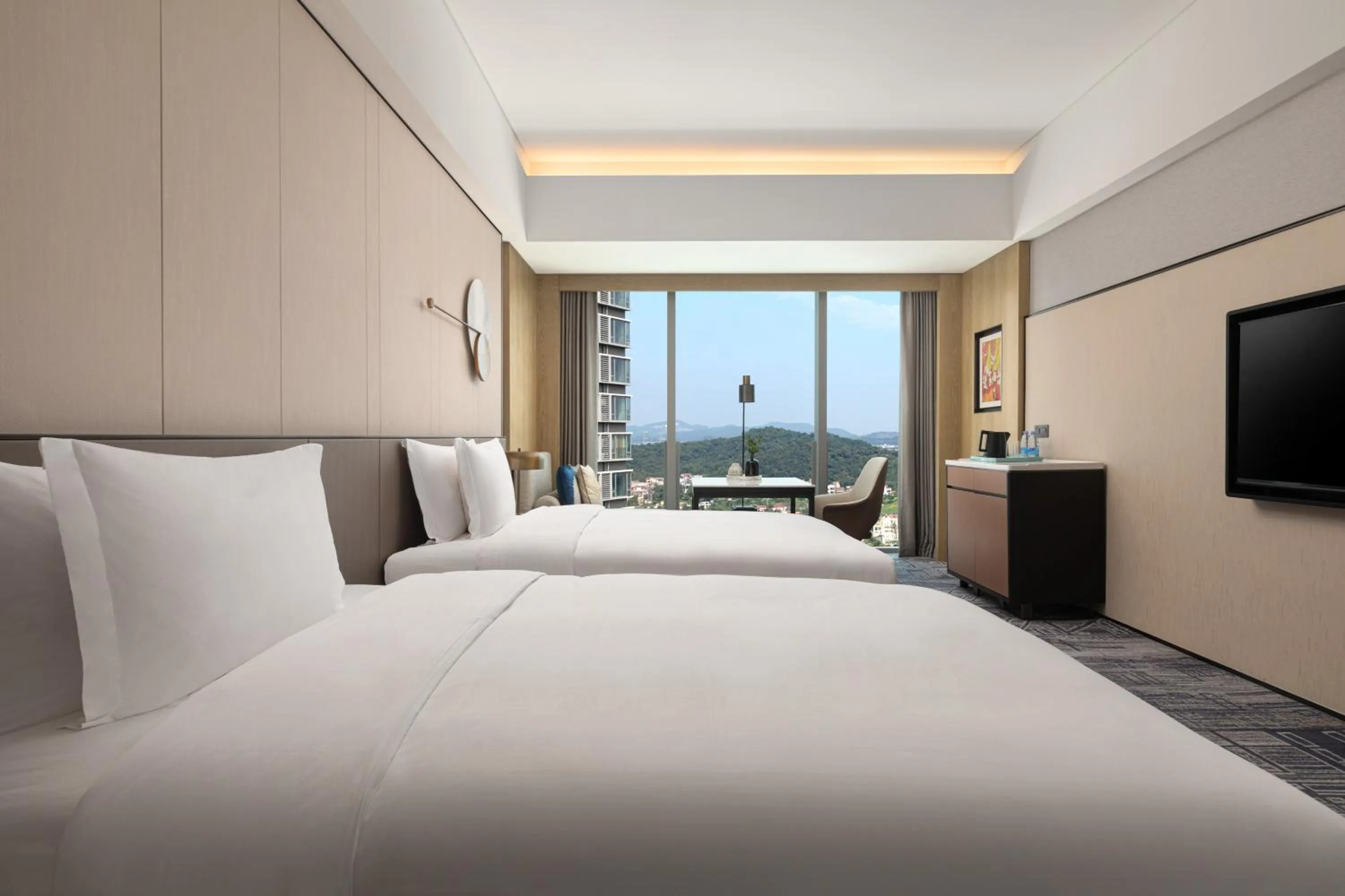 Bed in Crowne Plaza Jiangmen Binjiang by IHG