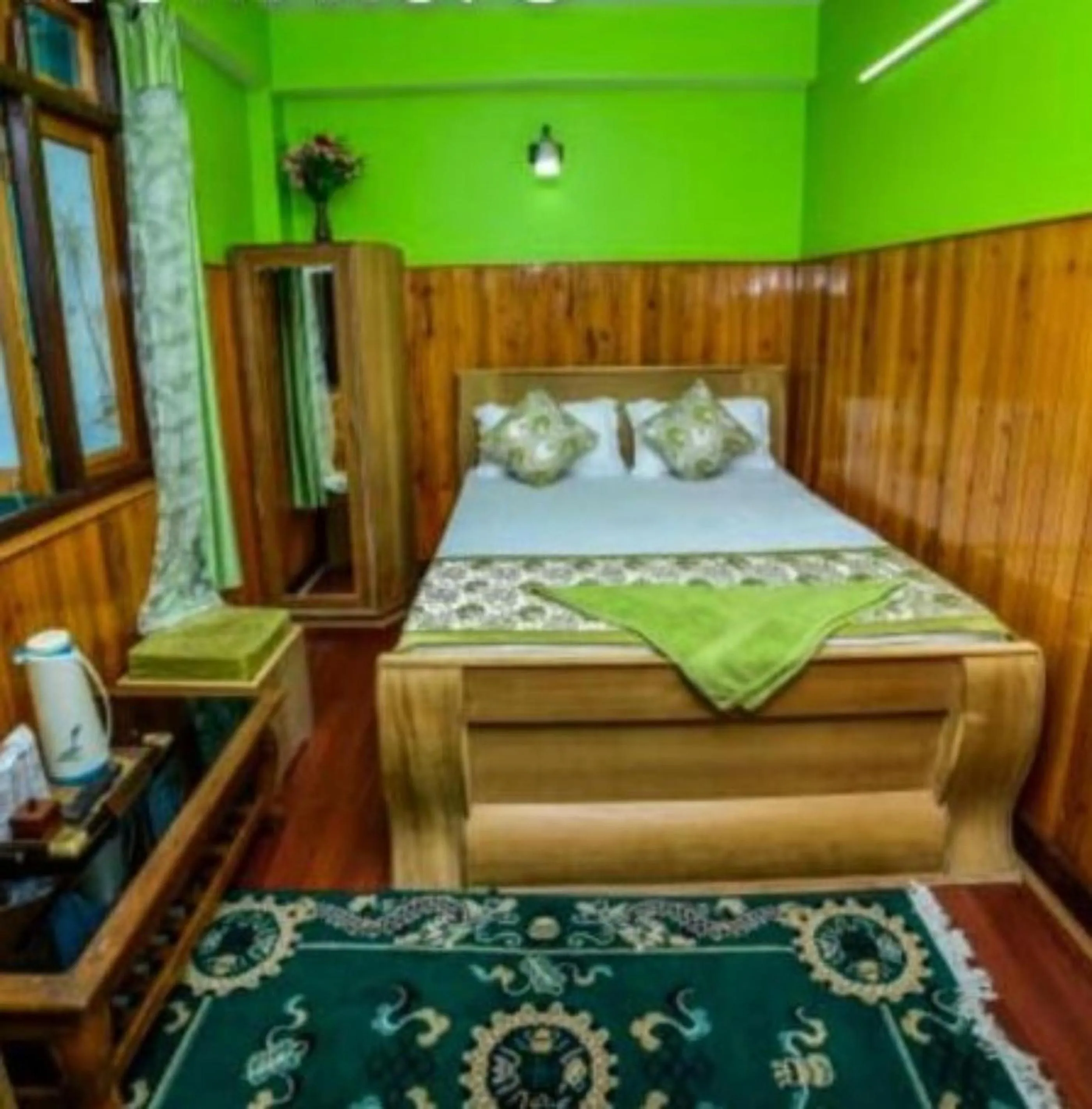 Bed in GRG Tharbaling Homestay Darjeeling