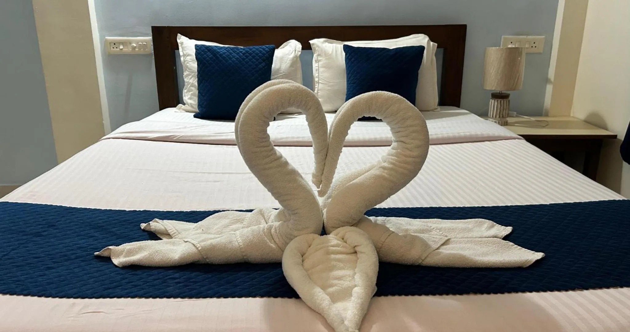 Decorative detail, Bed in Aqua Wave by YogiTree Hotels