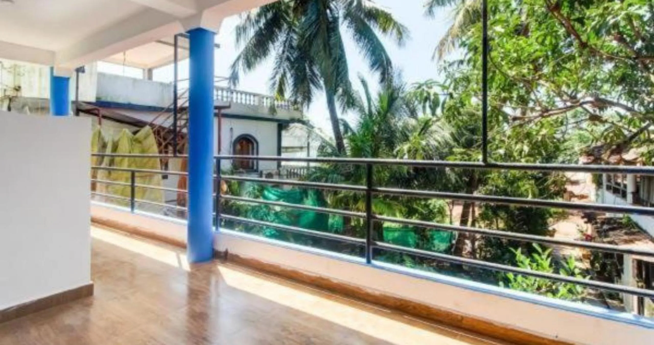 Balcony/Terrace in Aqua Wave by YogiTree Hotels