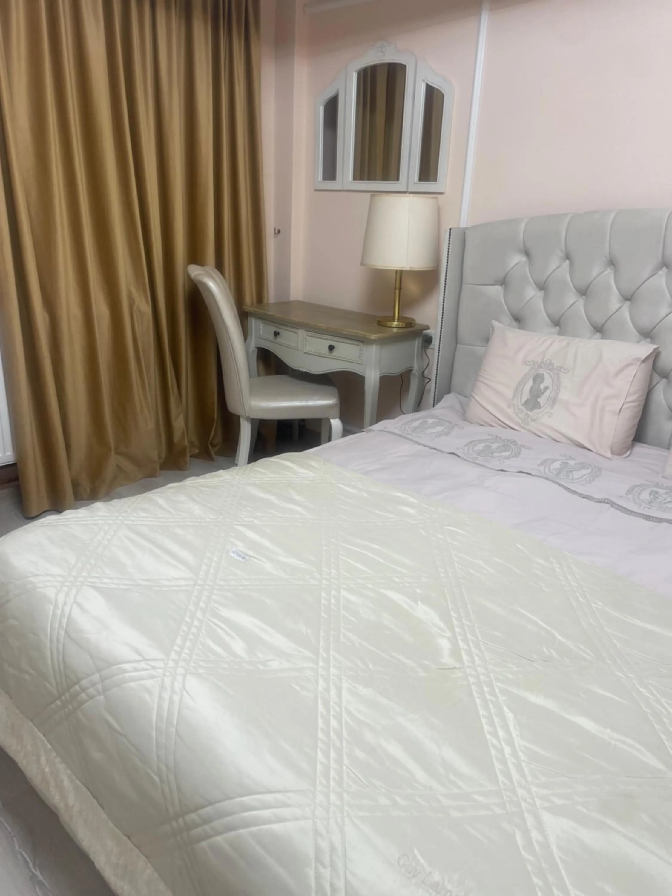 Bed in Hotel Jolie Apartments