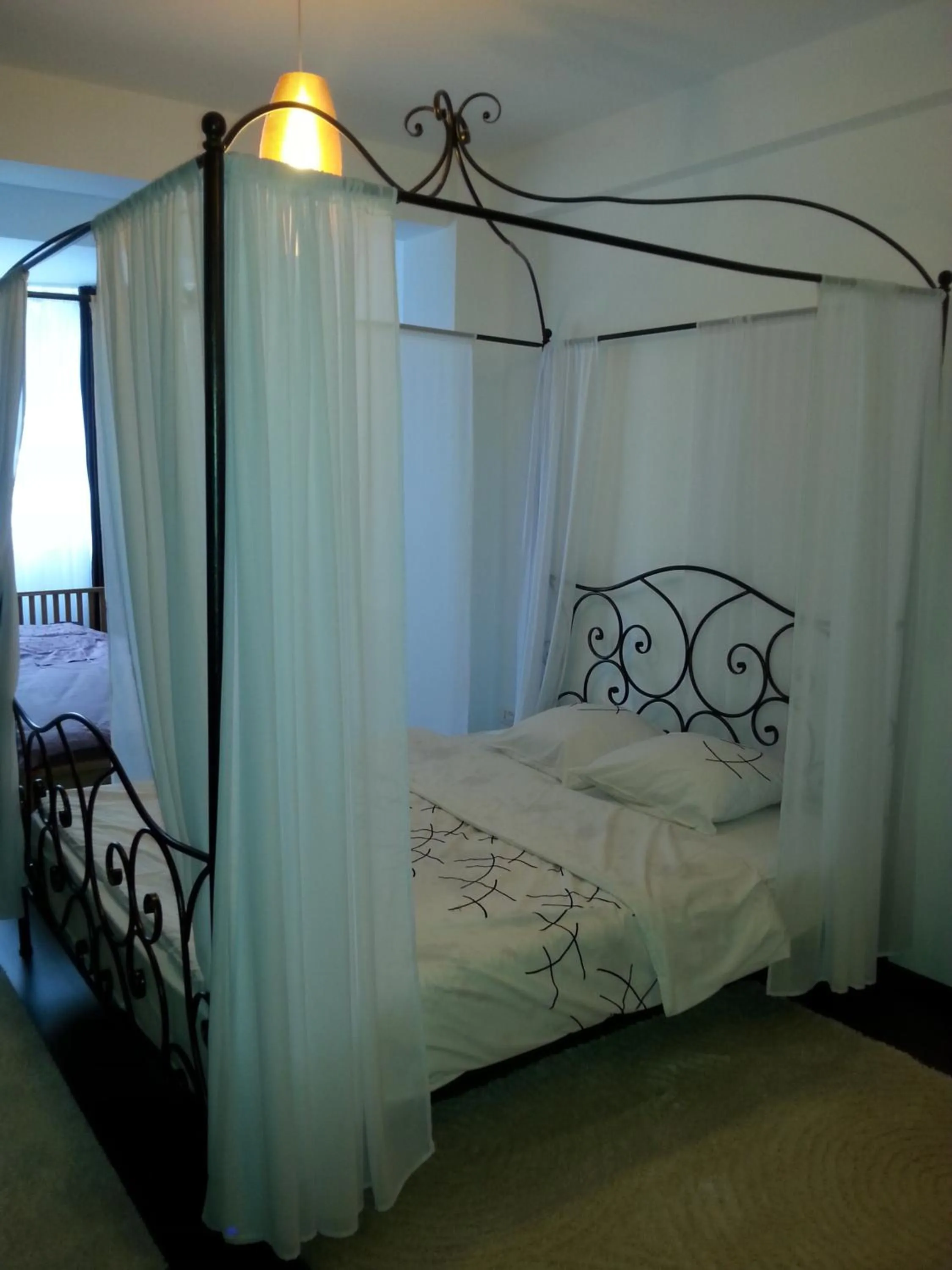 Bed in Hotel Jolie Apartments