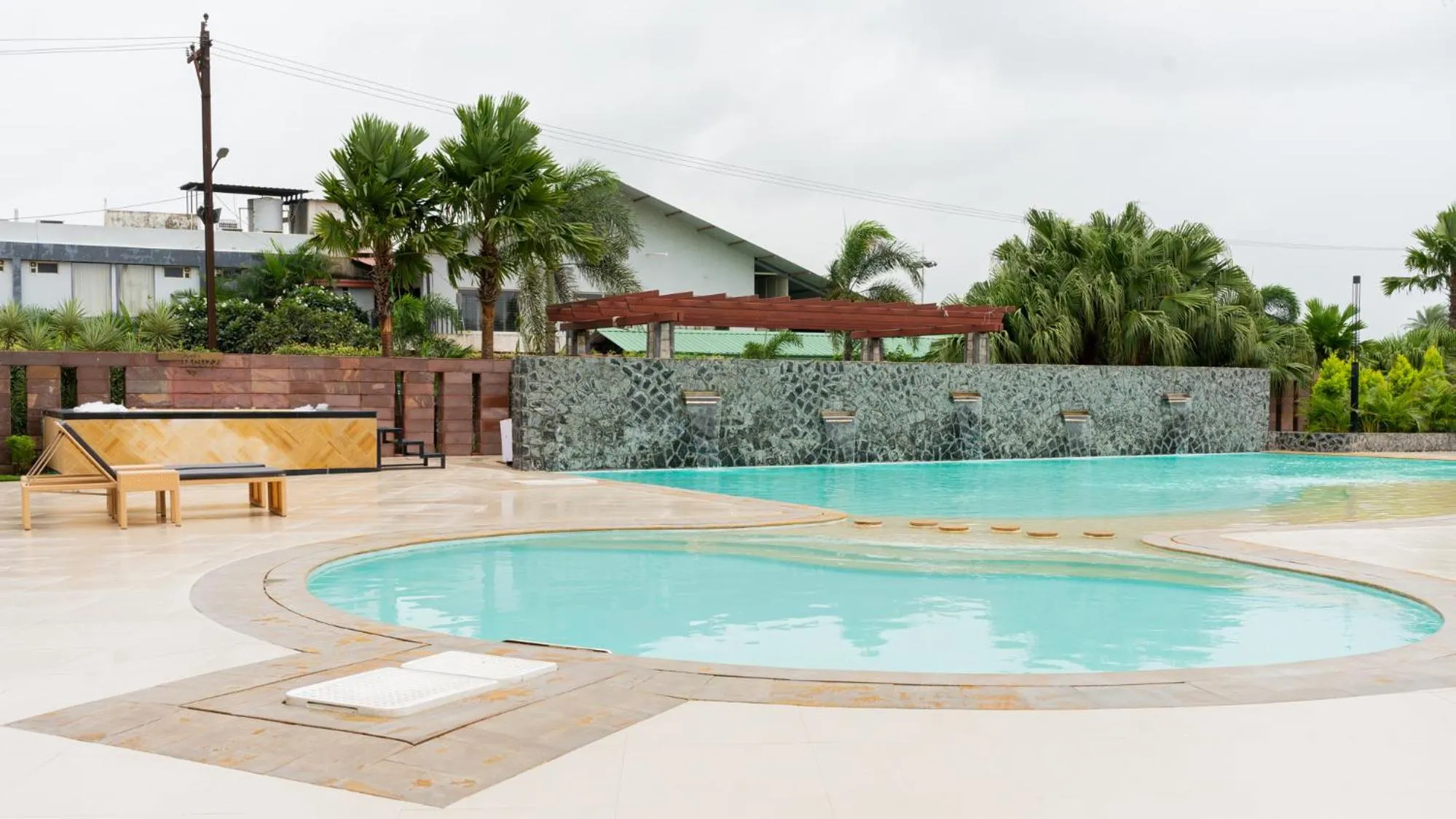 Swimming pool in Monk's Nirvanaa Hotel & Resort