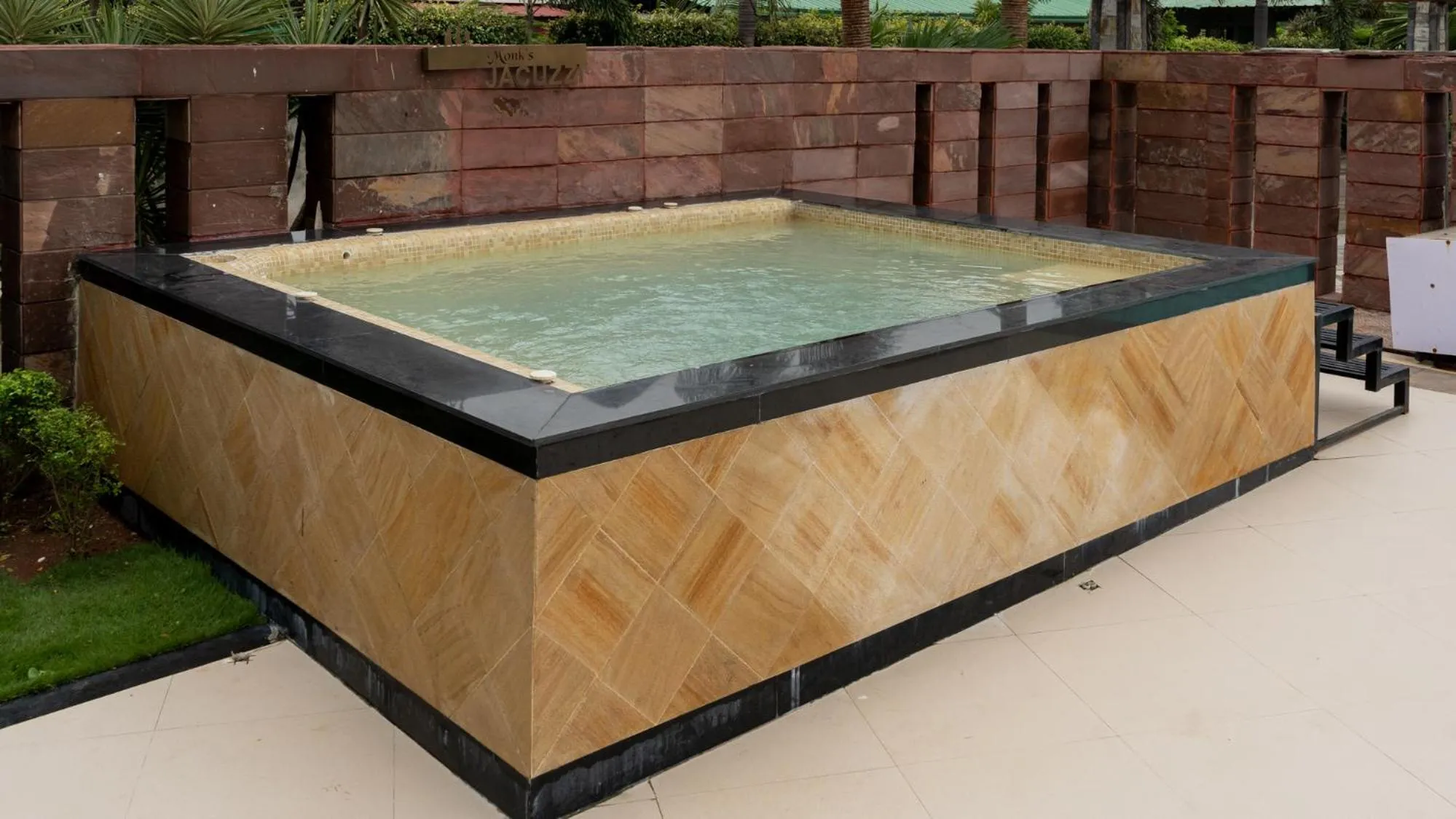 Swimming pool in Monk's Nirvanaa Hotel & Resort