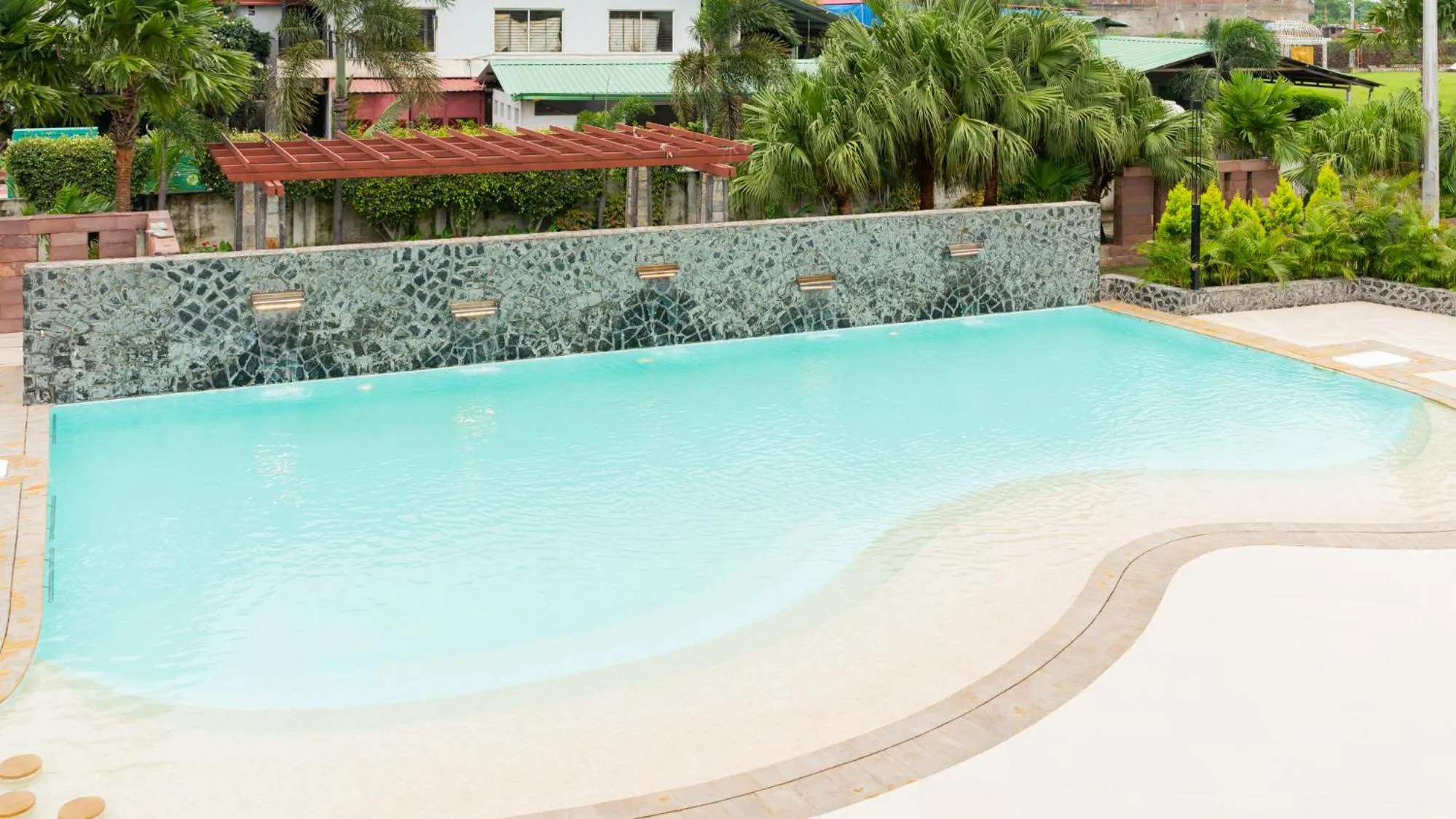 Swimming pool in Monk's Nirvanaa Hotel & Resort
