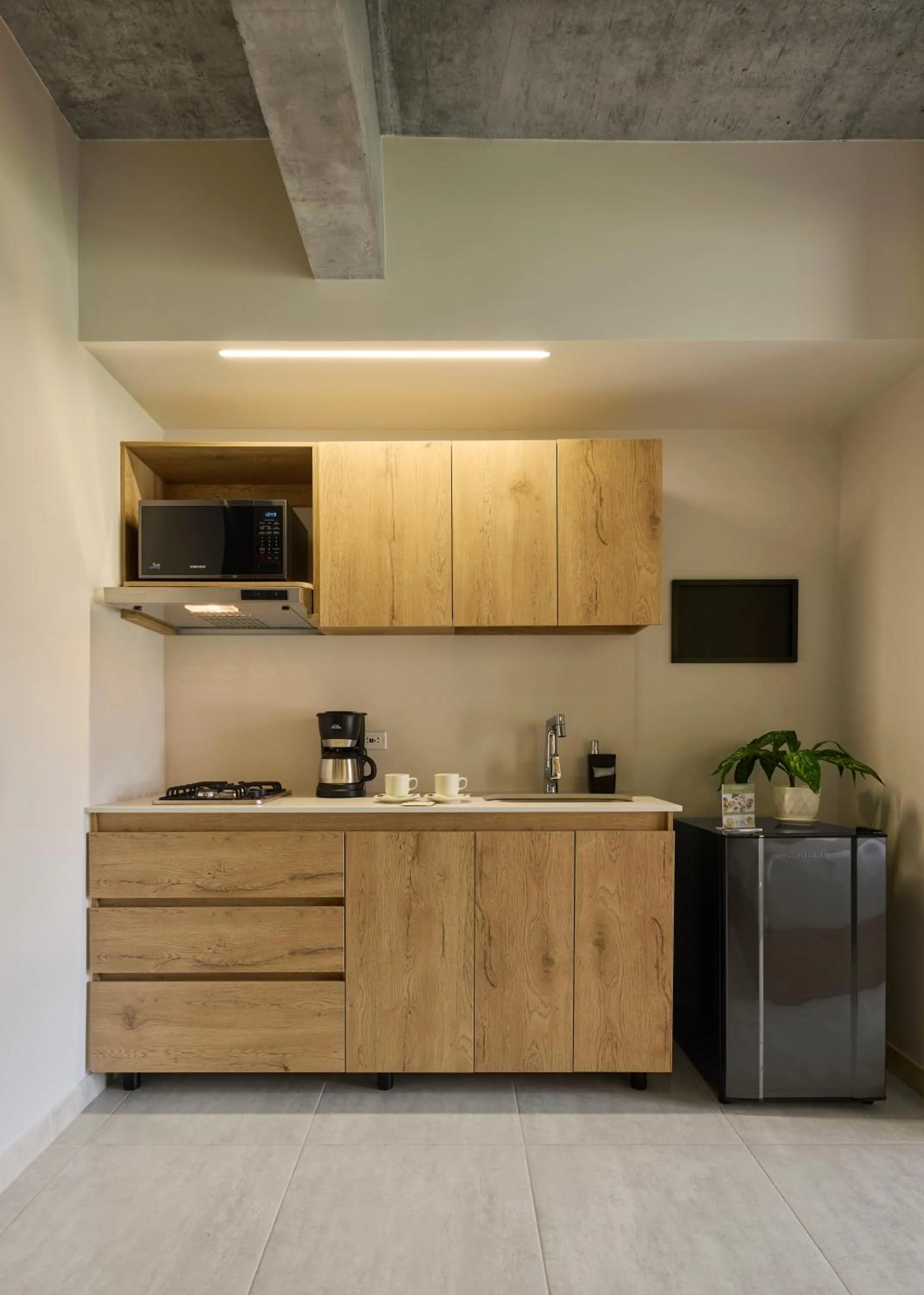 kitchen in 30 Living Suites