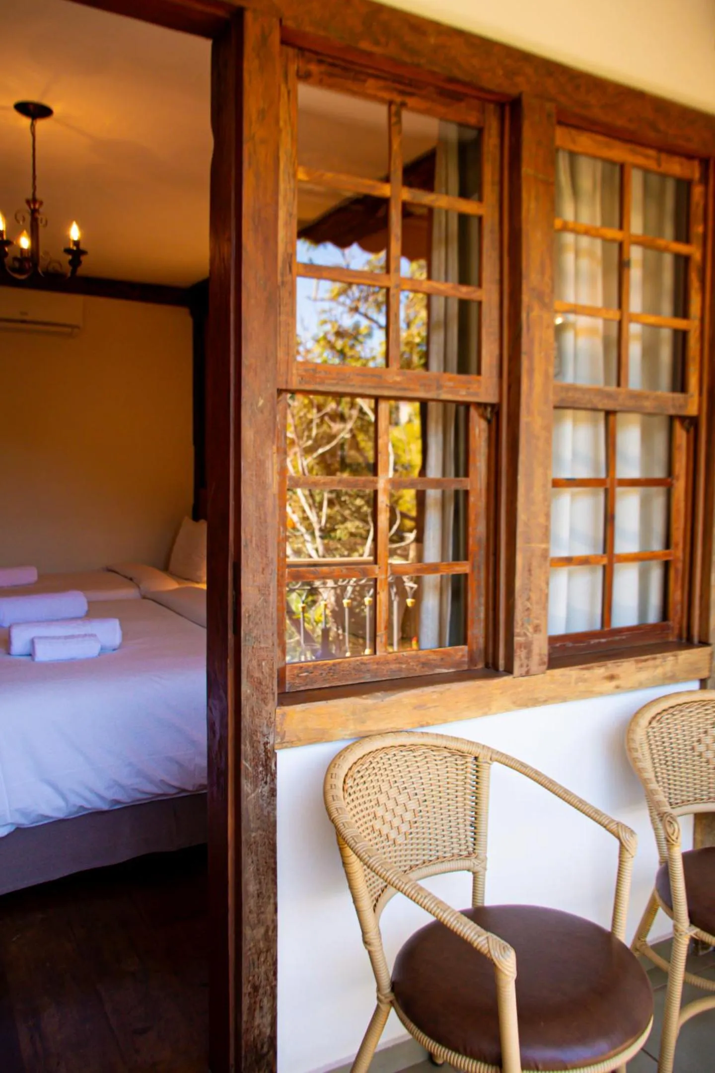 Balcony/Terrace, Bed in Pousada Chão de Minas