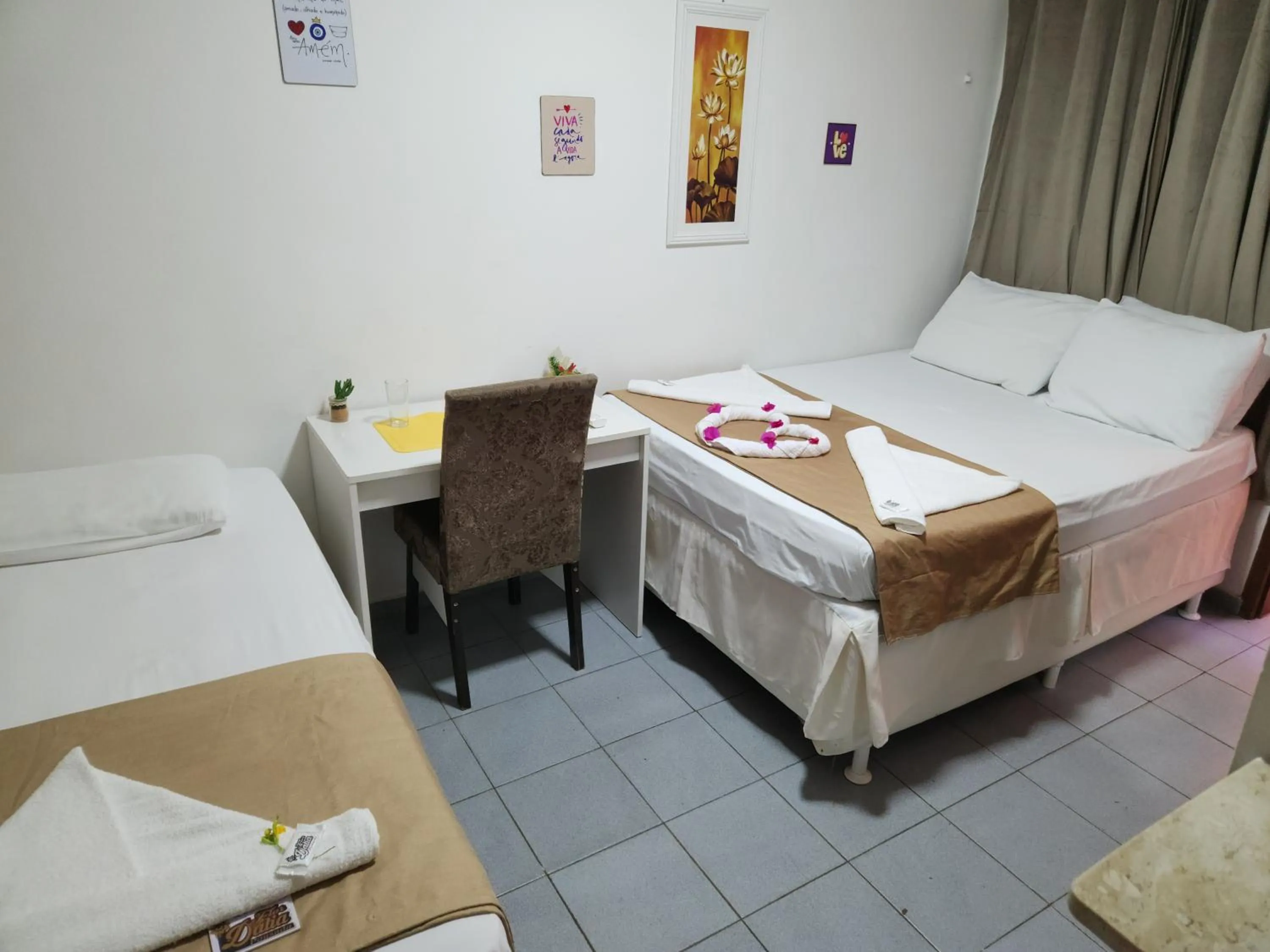 Bed in Pousada Flor Dália