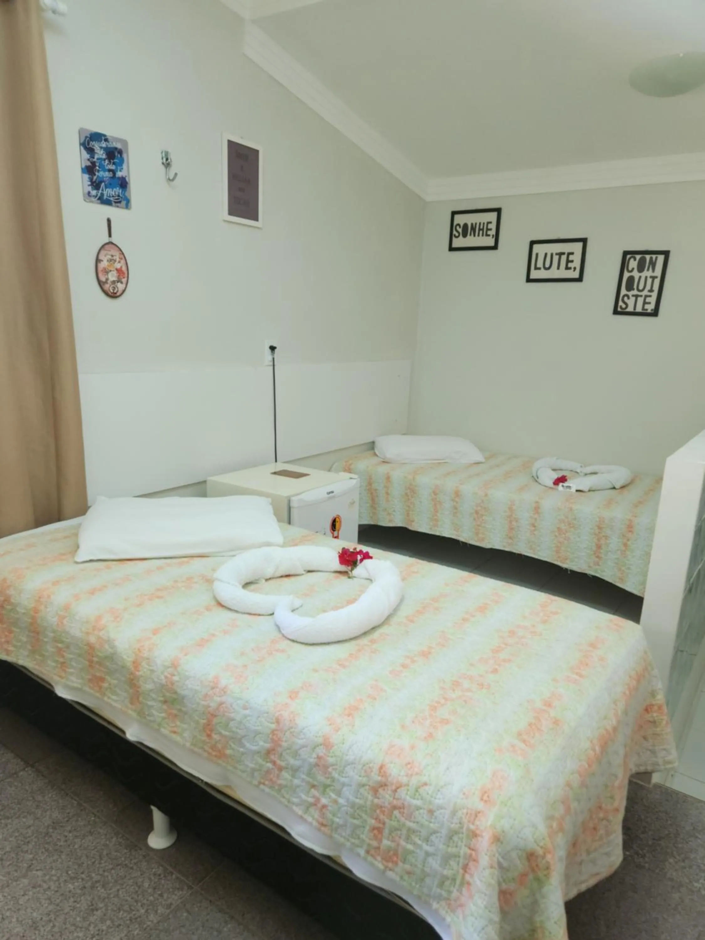 Bed in Pousada Flor Dália