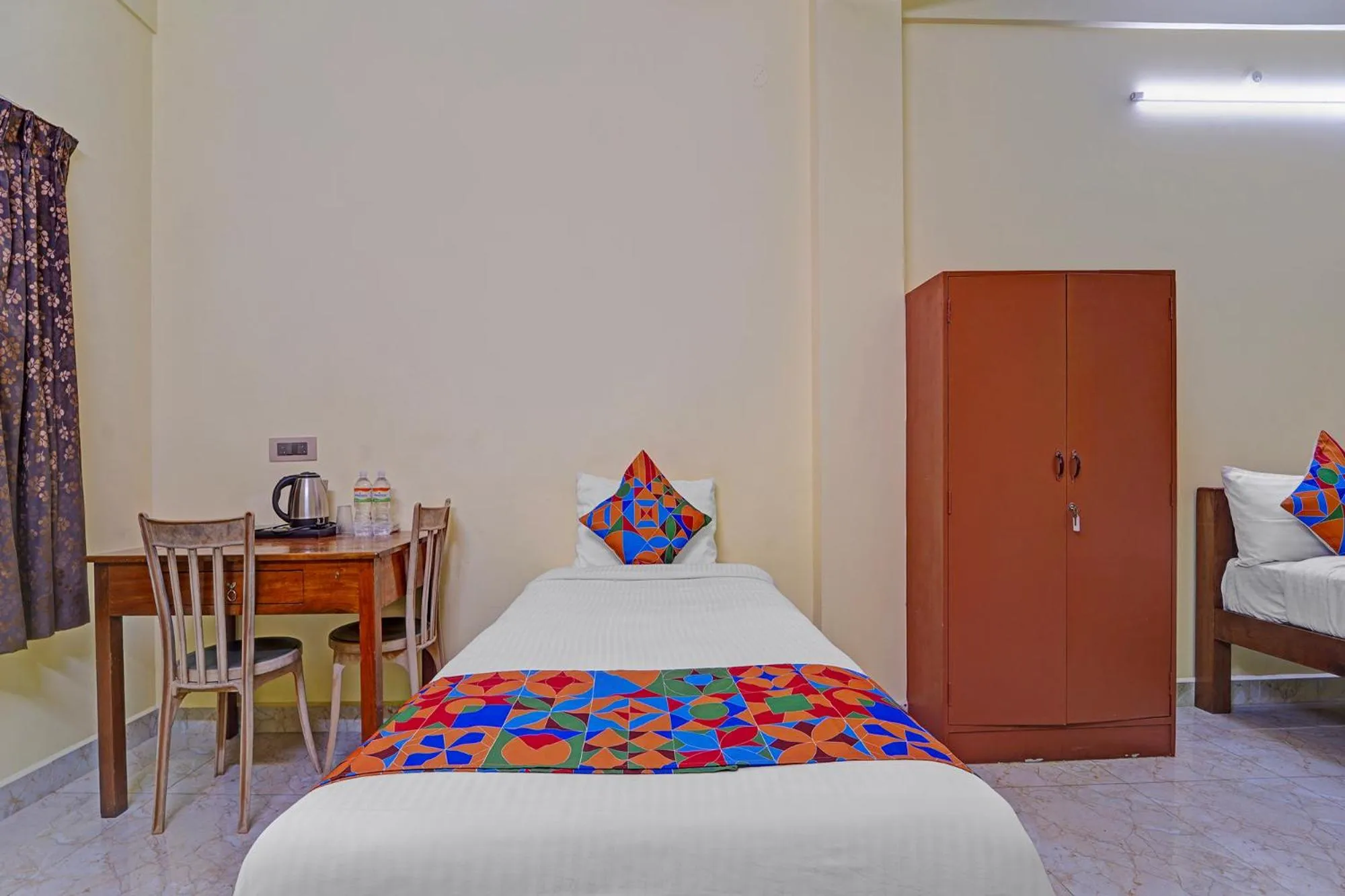 Bed in FabHotel Martine's Residency - French Colony, 5 Mins from Rock Beach