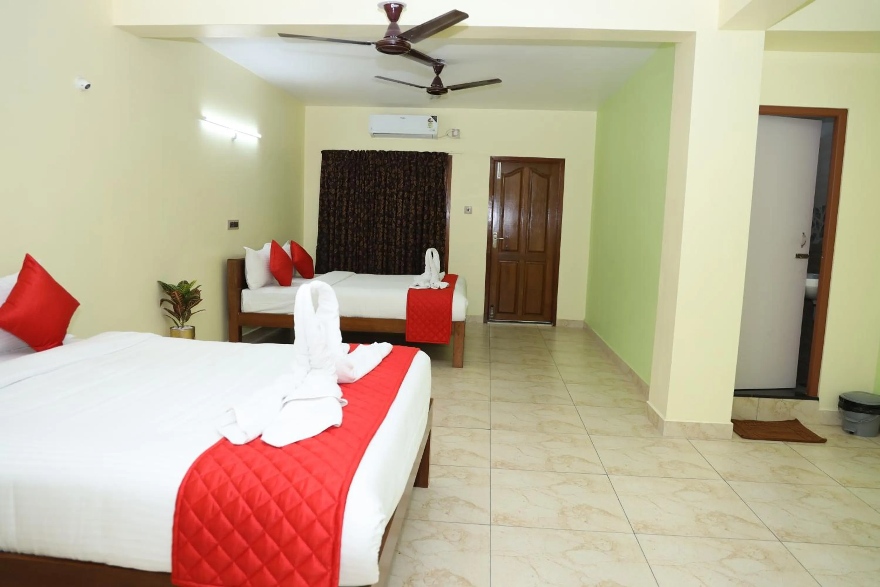 Family Room with Balcony in Martine's Residency