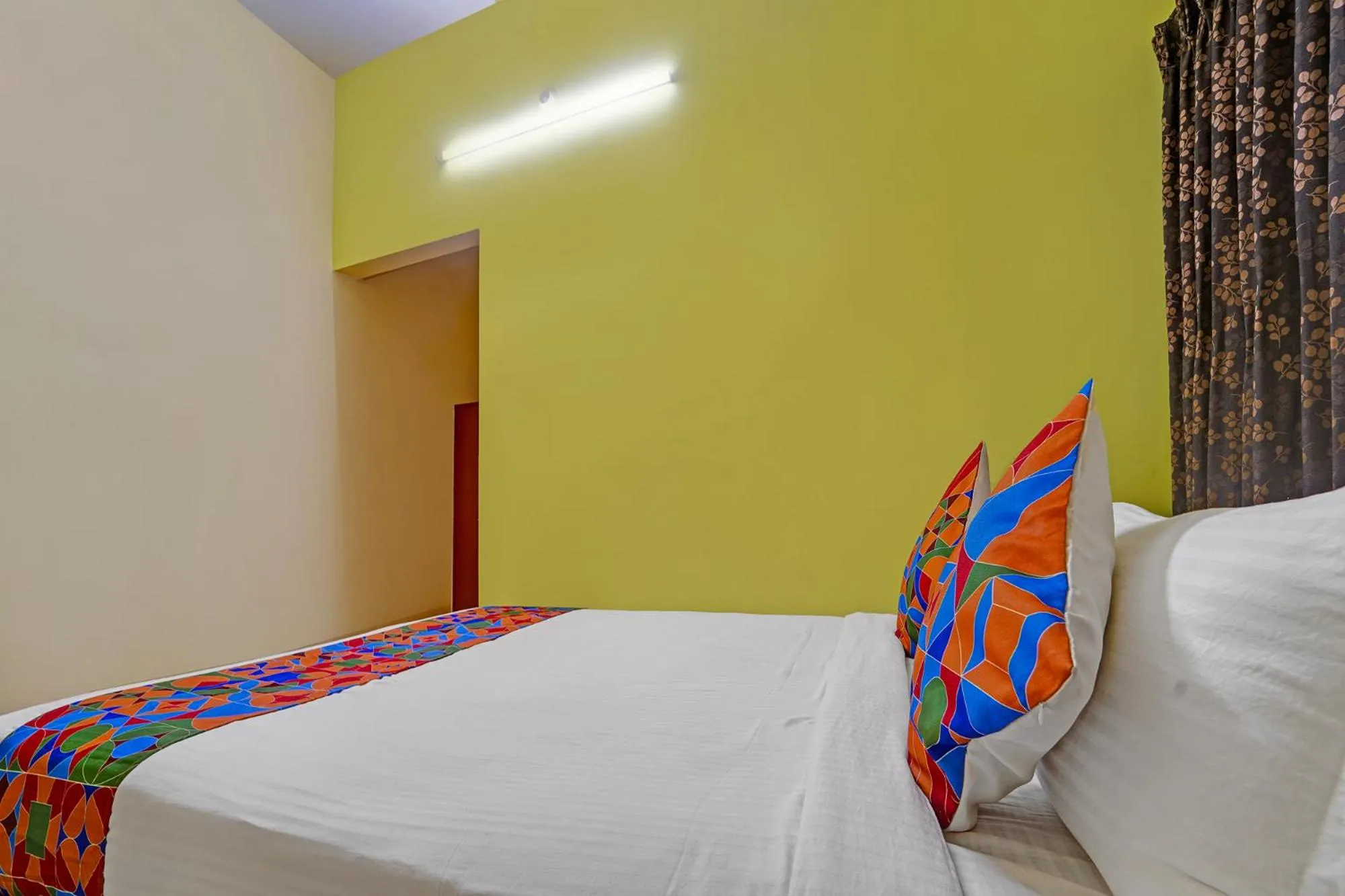 Bed in FabHotel Martine's Residency - French Colony, 5 Mins from Rock Beach