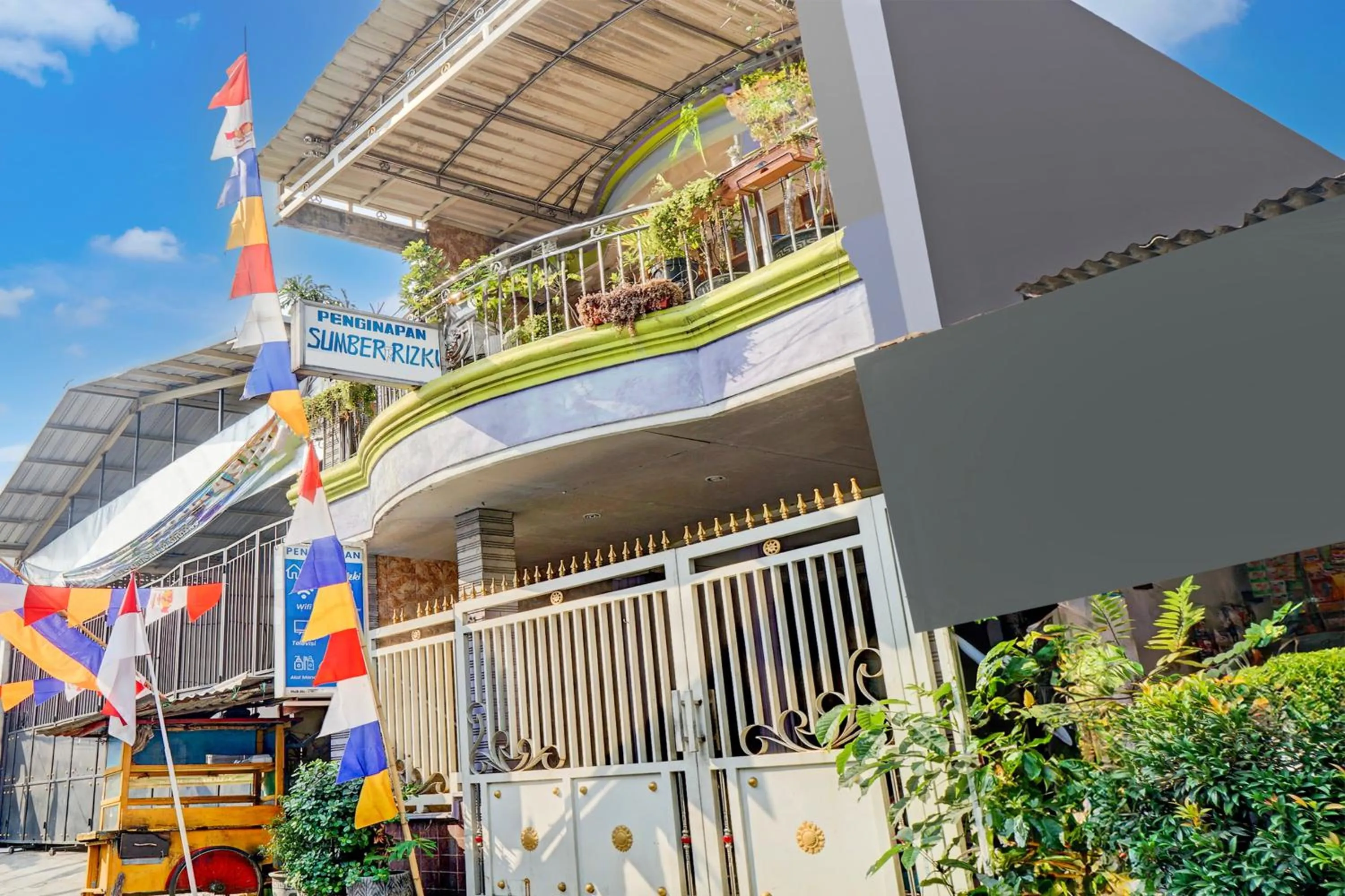 Facade/entrance in OYO 93069 Penginapan Sumber Rizki