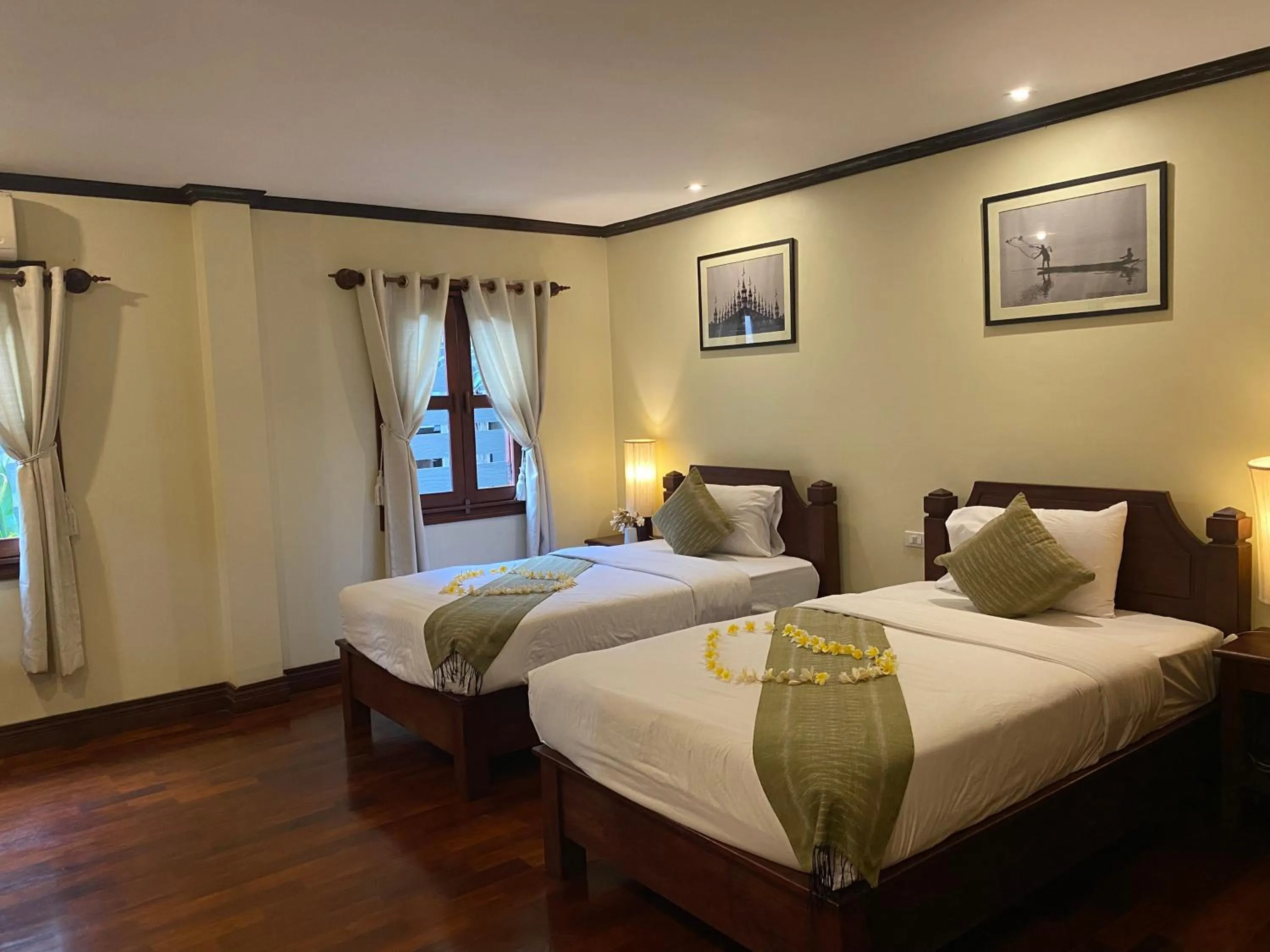 Photo of the whole room, Bed in Luang Prabang Residence & Travel