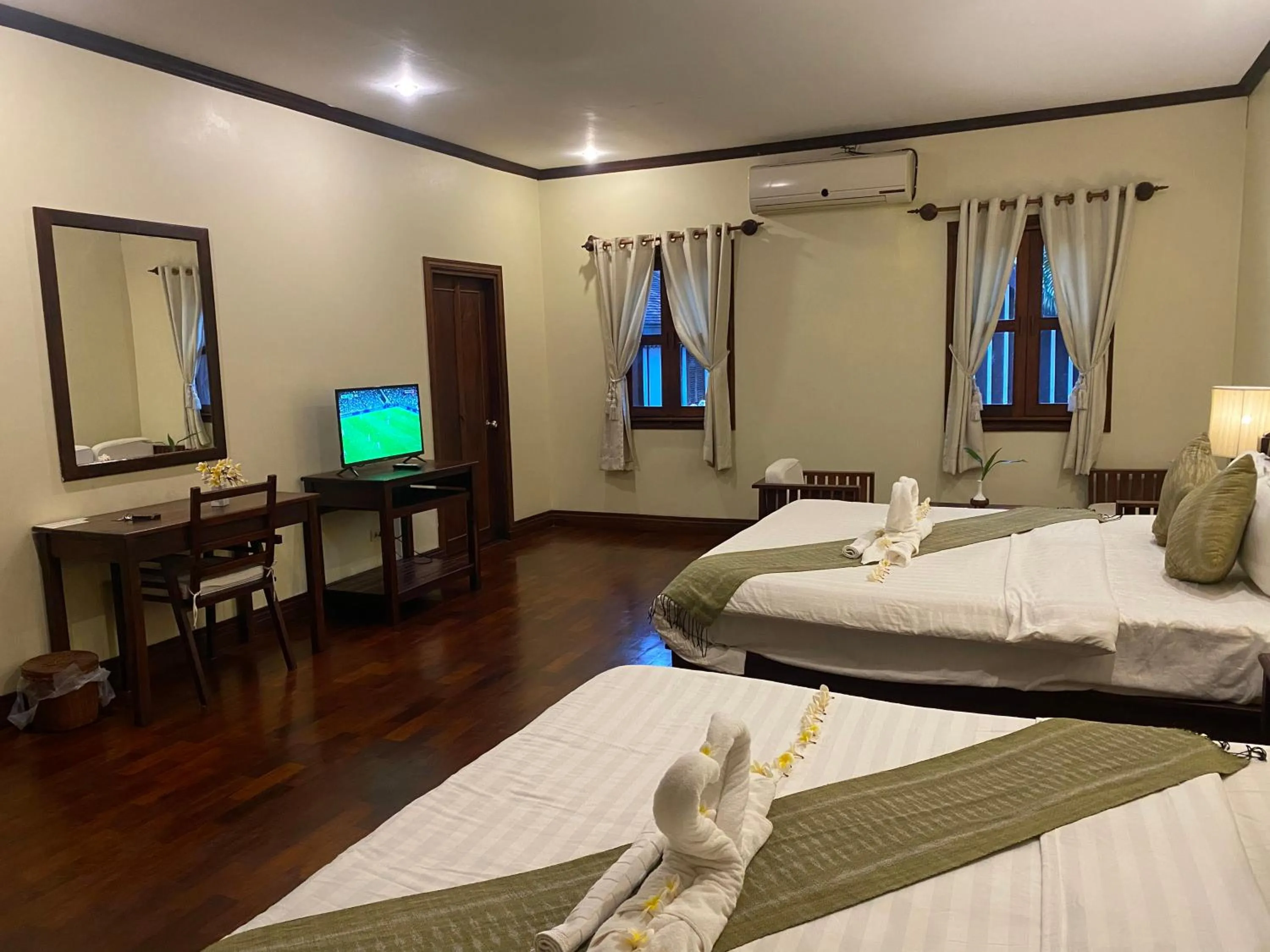 Bed in Luang Prabang Residence & Travel