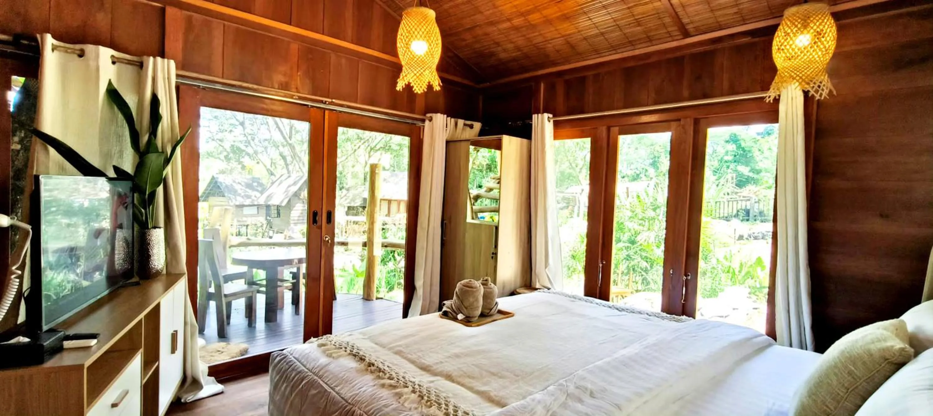 Bed in Uma Villa Manado