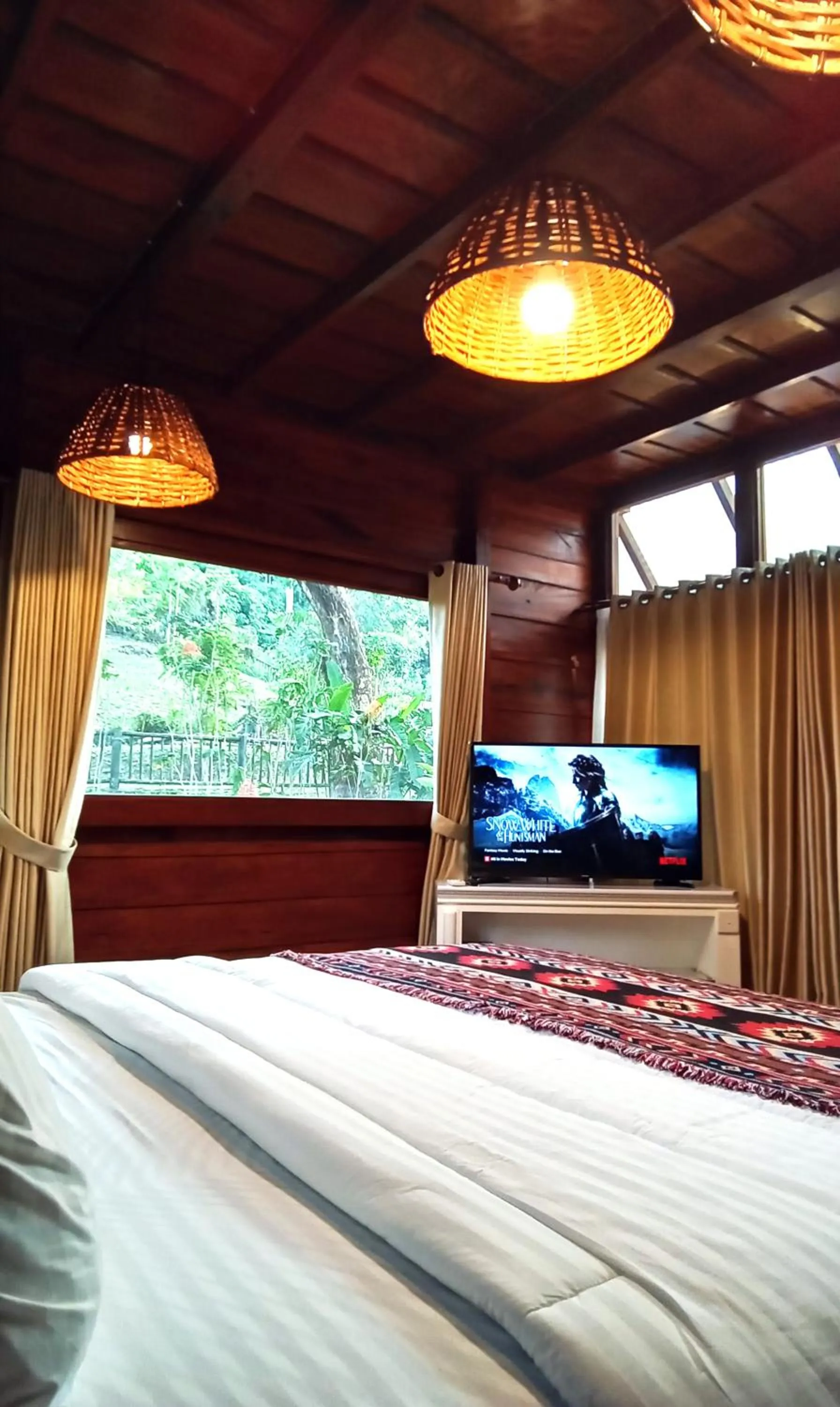 Bed in Uma Villa Manado