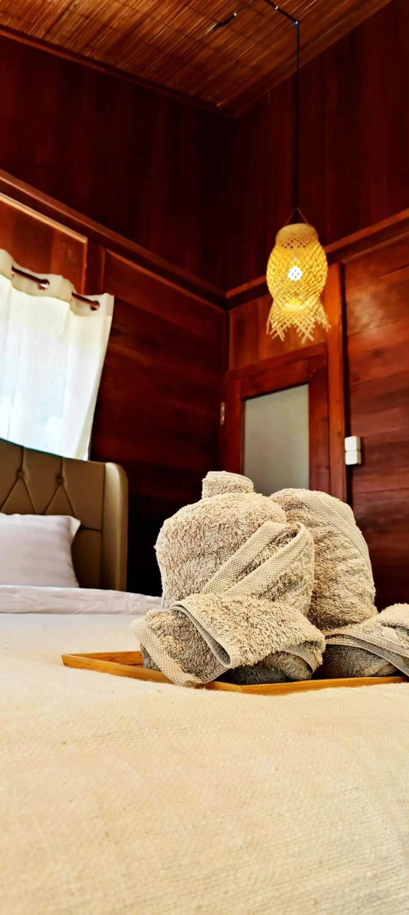 Bed in Uma Villa Manado