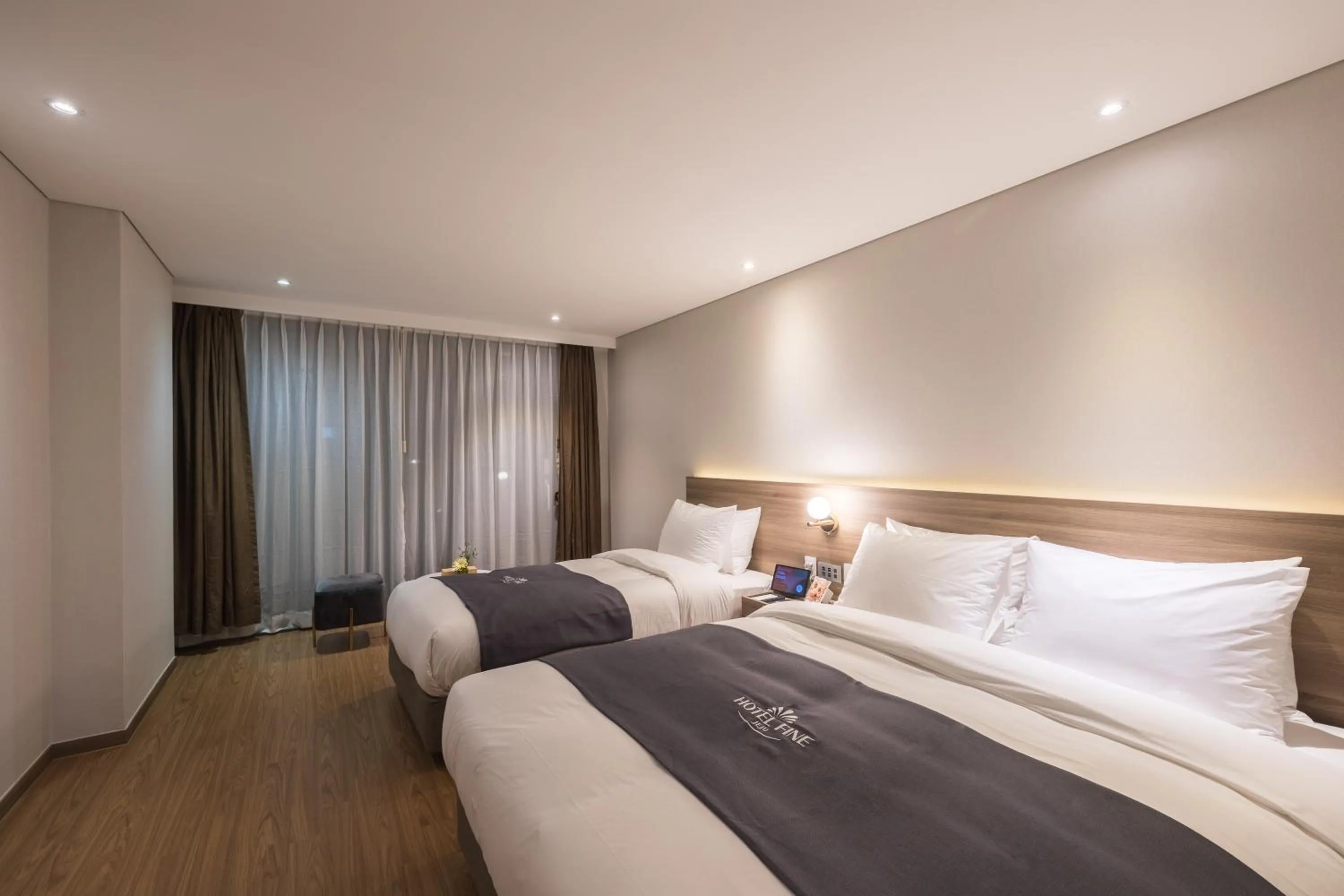 Bed in Hotel Fine Jeju