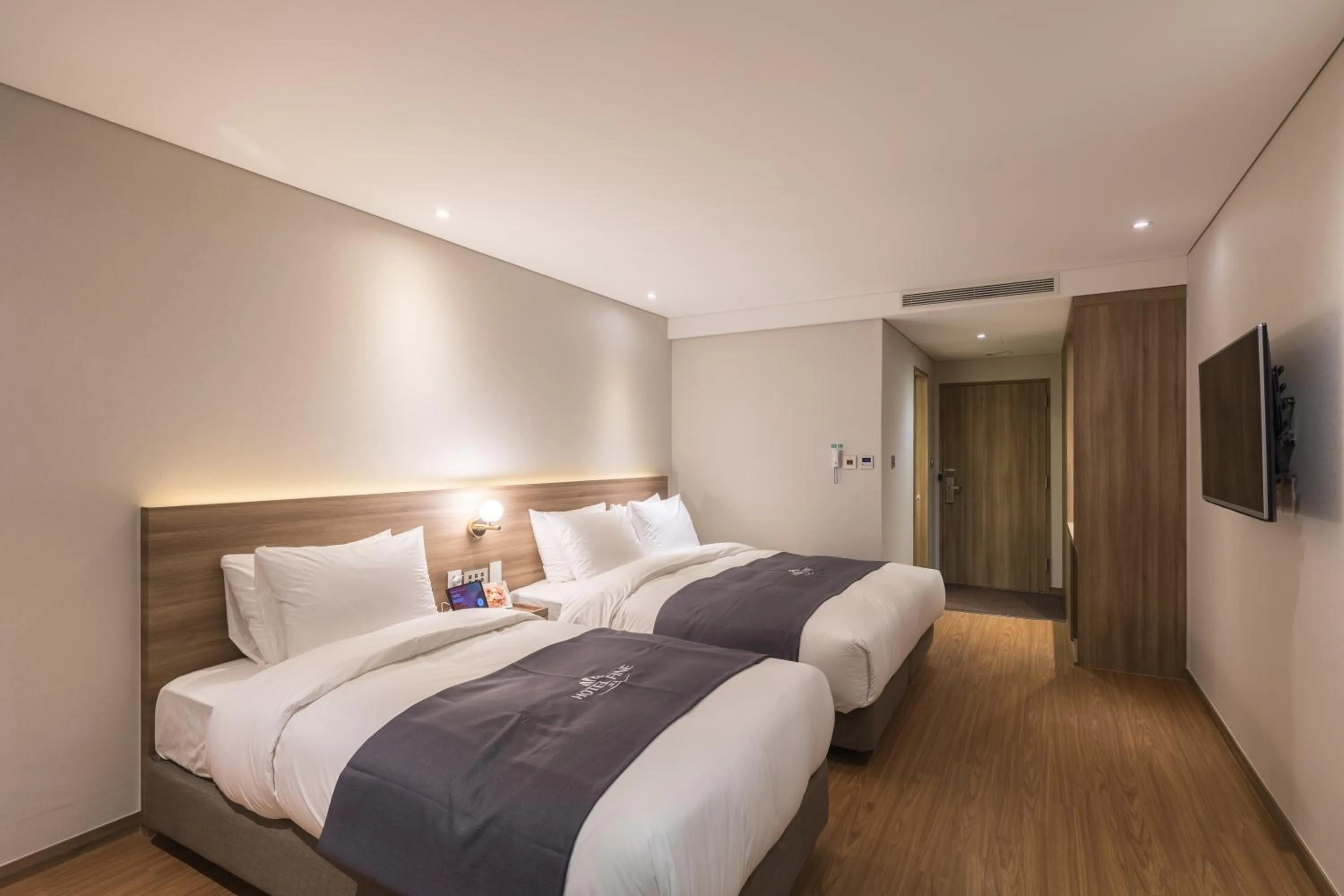 Bed in Hotel Fine Jeju