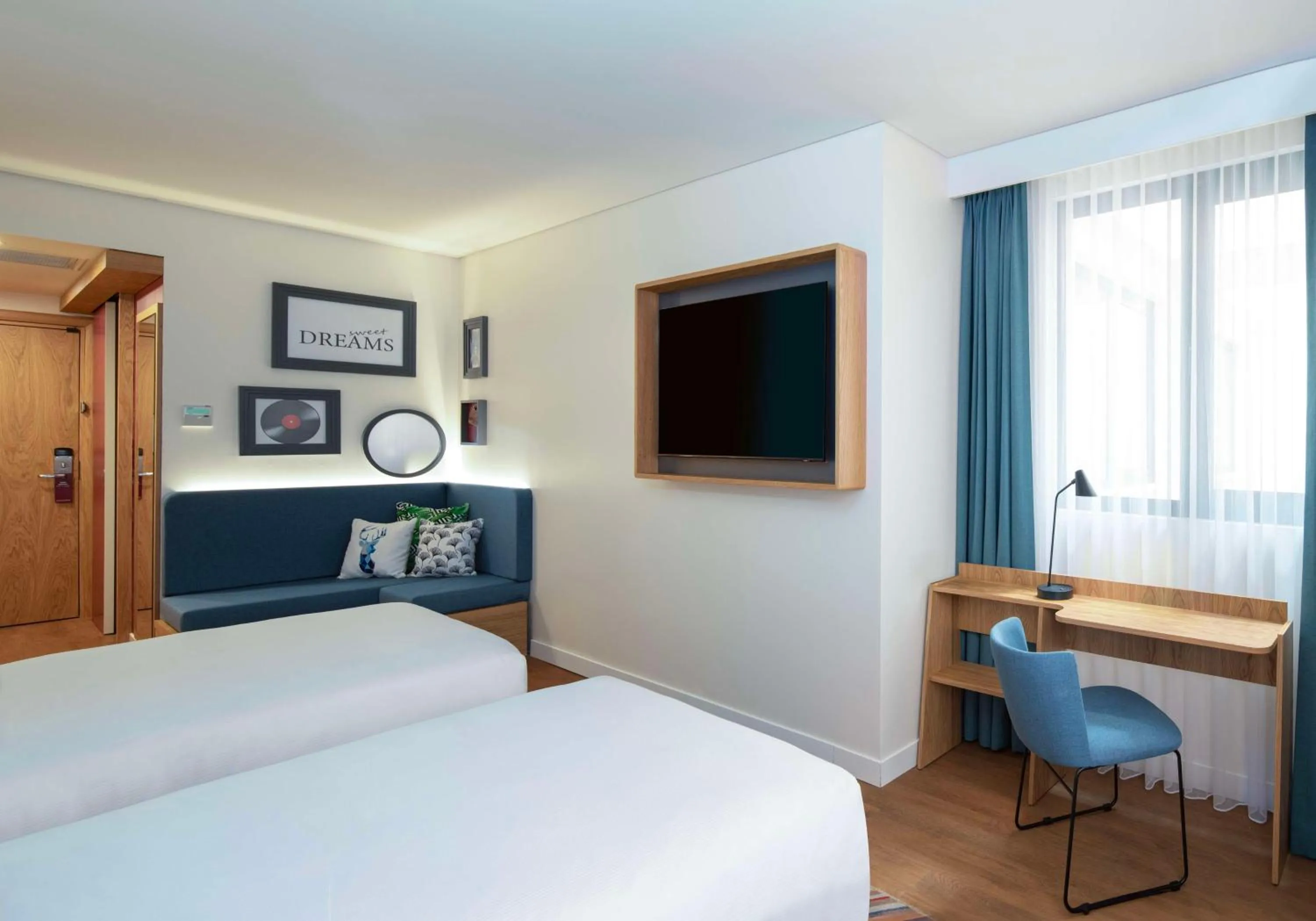 Living room, Bed in Hampton By Hilton Istanbul Sirkeci