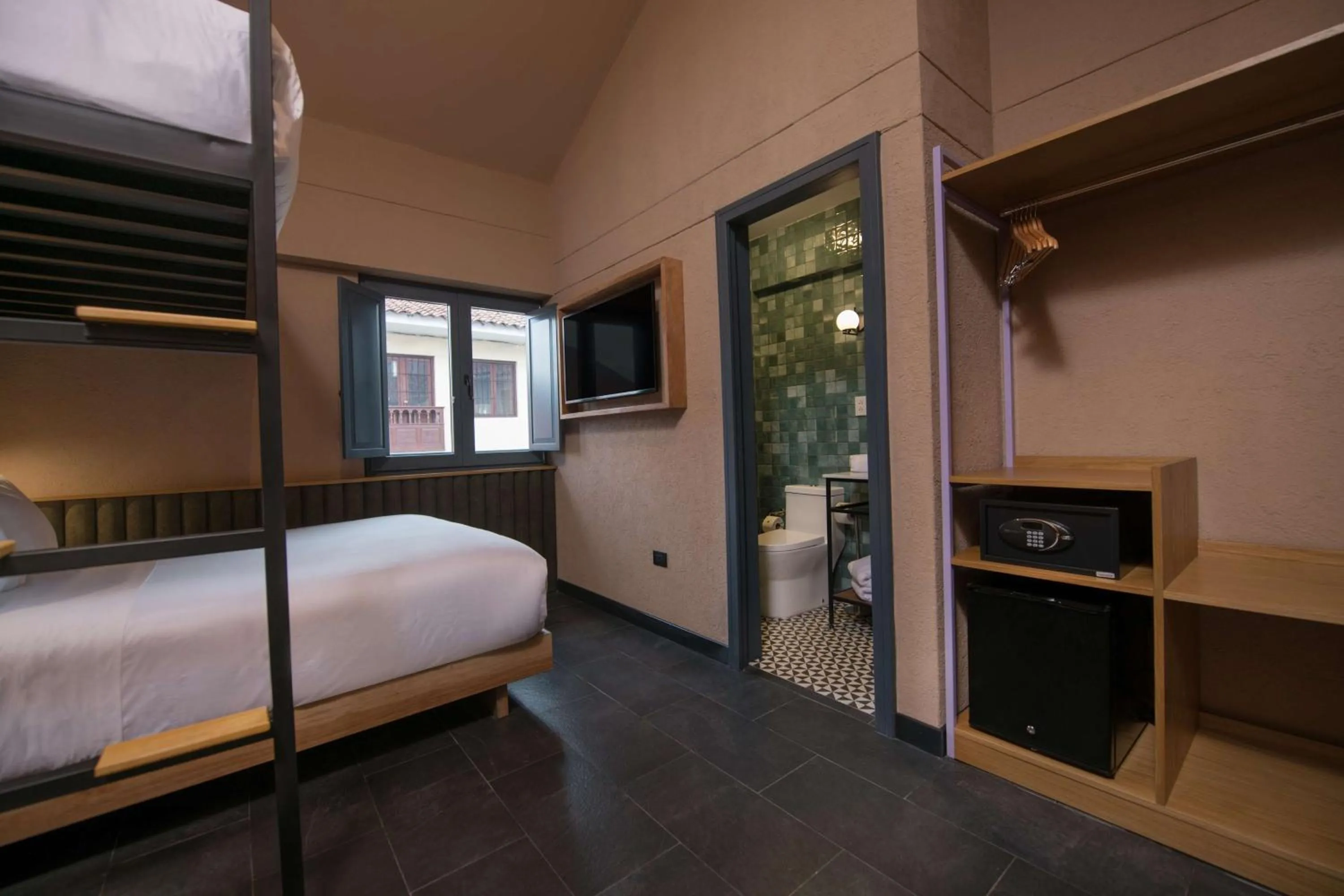 Photo of the whole room, Bed in Motto By Hilton Cusco