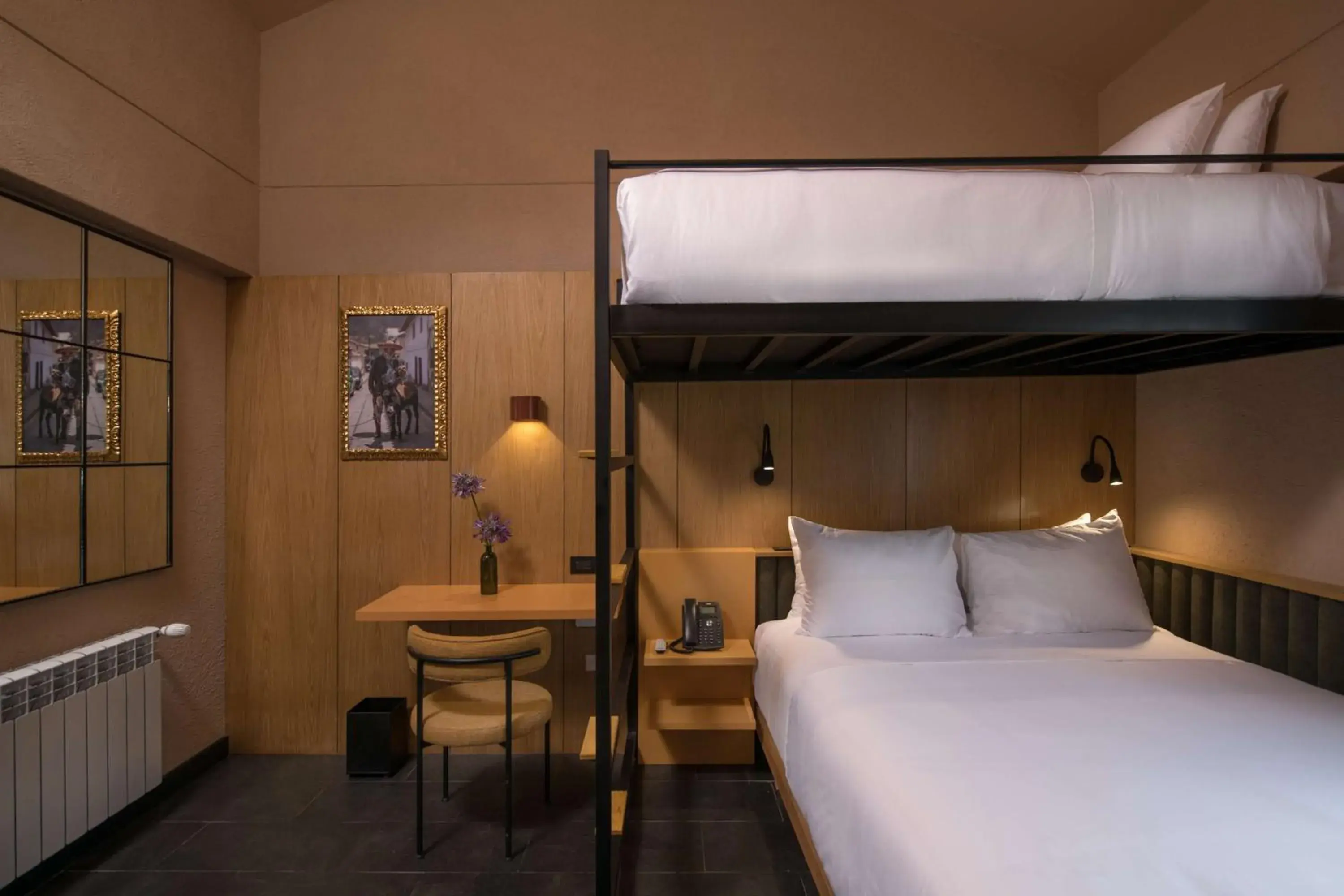 Room with Bunk Beds-One Twin Bed over One Queen Bed in Motto By Hilton Cusco Room with Bunk Beds-One Twin Bed over One Queen Bed in Motto By Hilton Cusco
