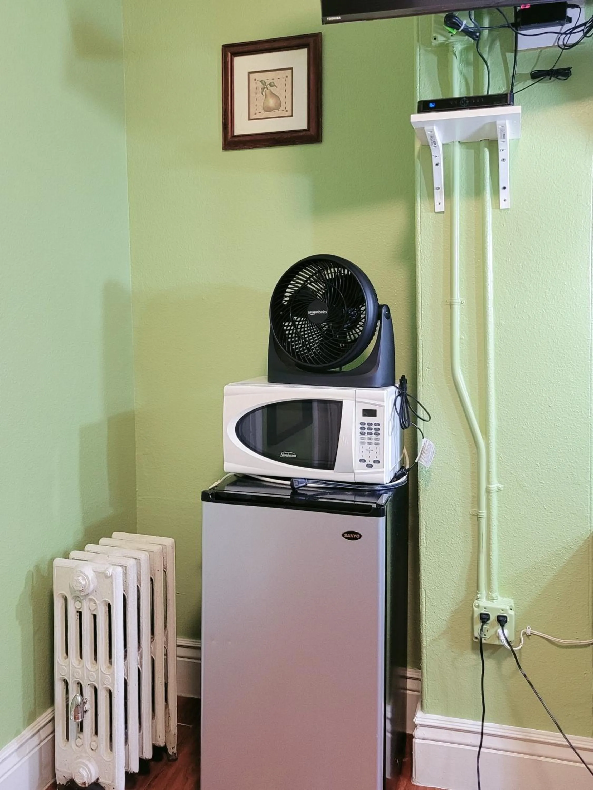 fireplace in Orange Village Hostel