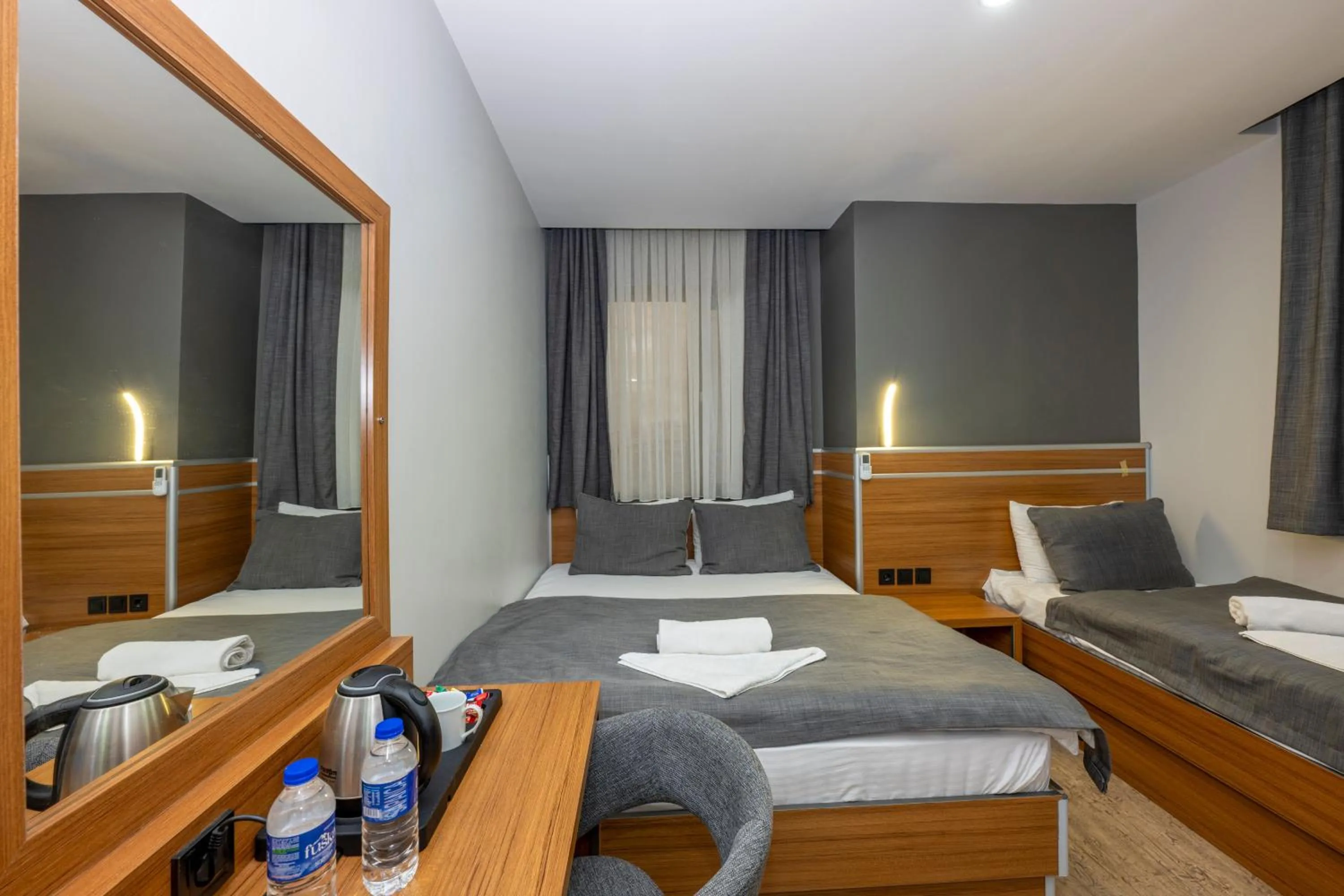 Living room, Bed in mayza otel