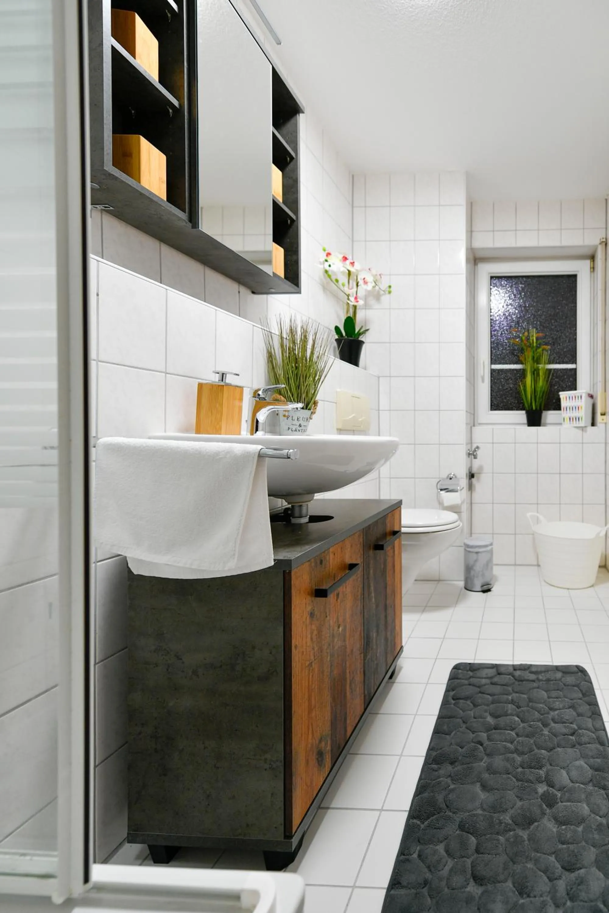 Bathroom in Exklusives-City-Apartment mit gratis Tiefgarage, Balkon, Waschtrockner, Netflix