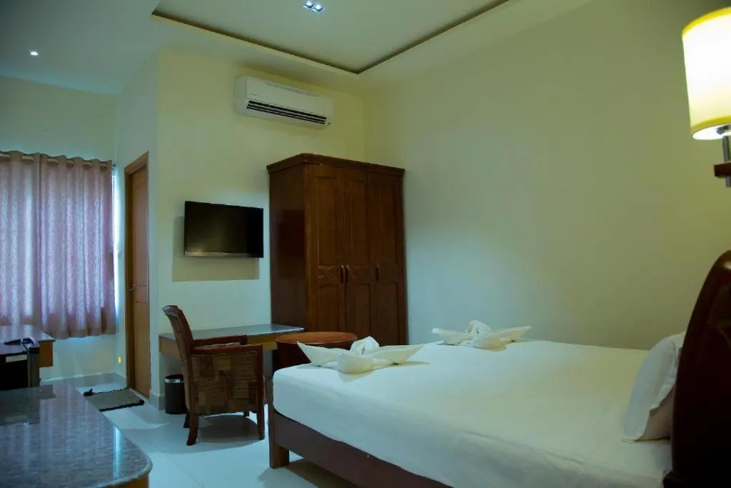 Photo of the whole room, Bed in The Grand White Palace