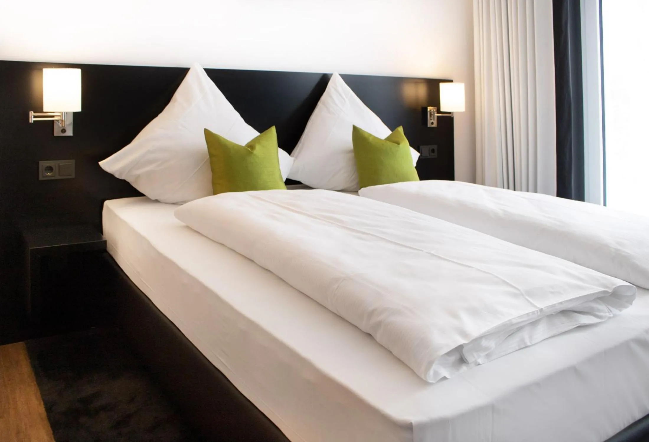 Bed in LGO Hotel by WMM Hotels